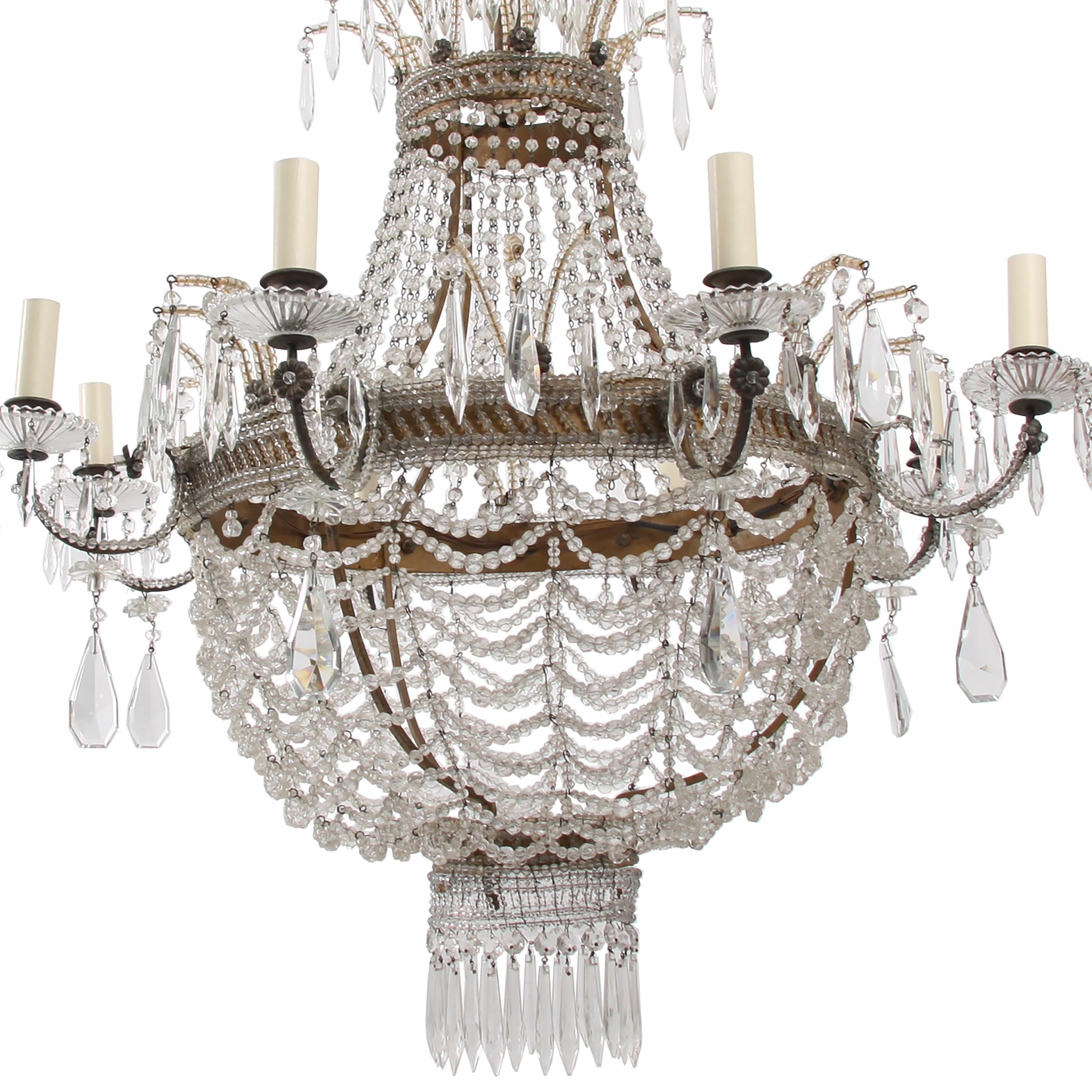 Beautiful large Italian 'basket' style chandelier. This stunning piece features 8 arms, gorgeous detail and was made in the mid-20th century.

Rewired.