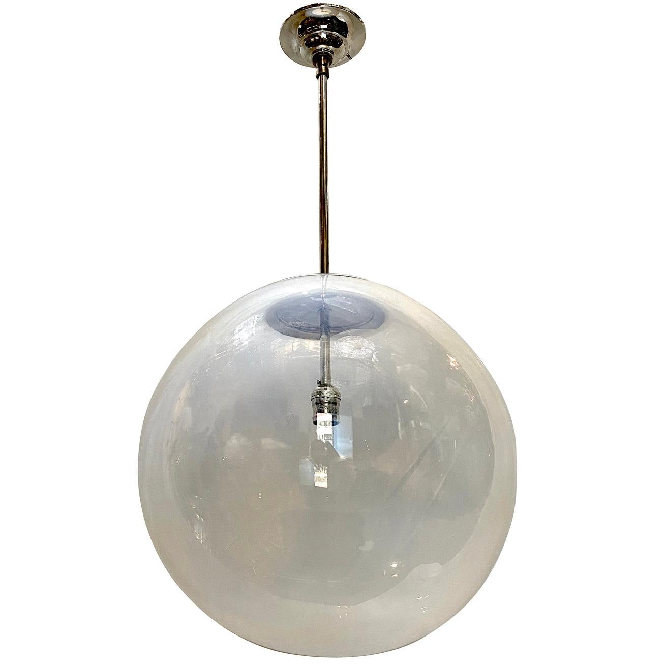 A circa 1960s large hand blown opaline glass light fixture with interior light.

Measurements:
Diameter 16