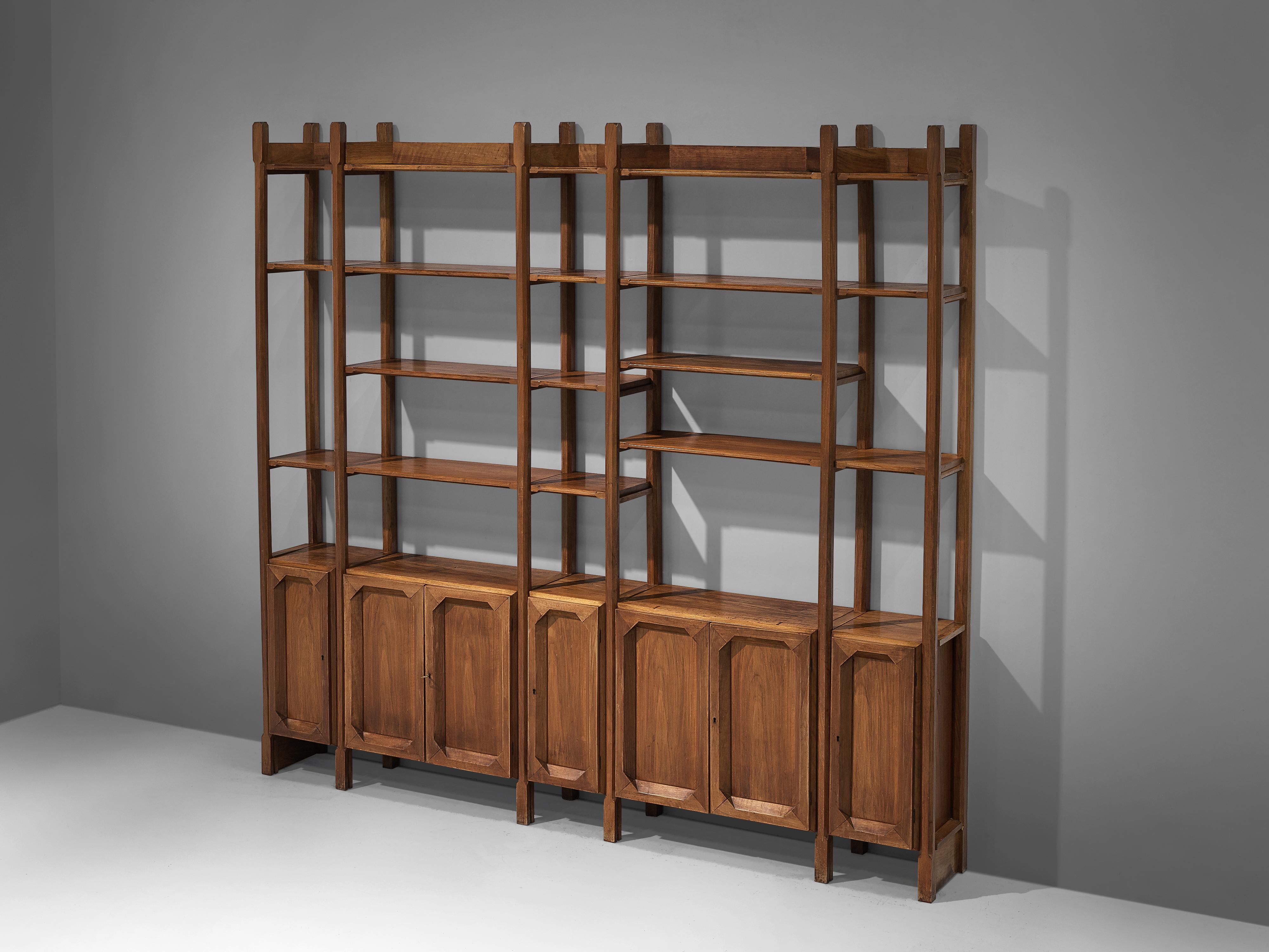 Mid-20th Century Large Italian Bookcase with Cabinets and Carved Details in Walnut
