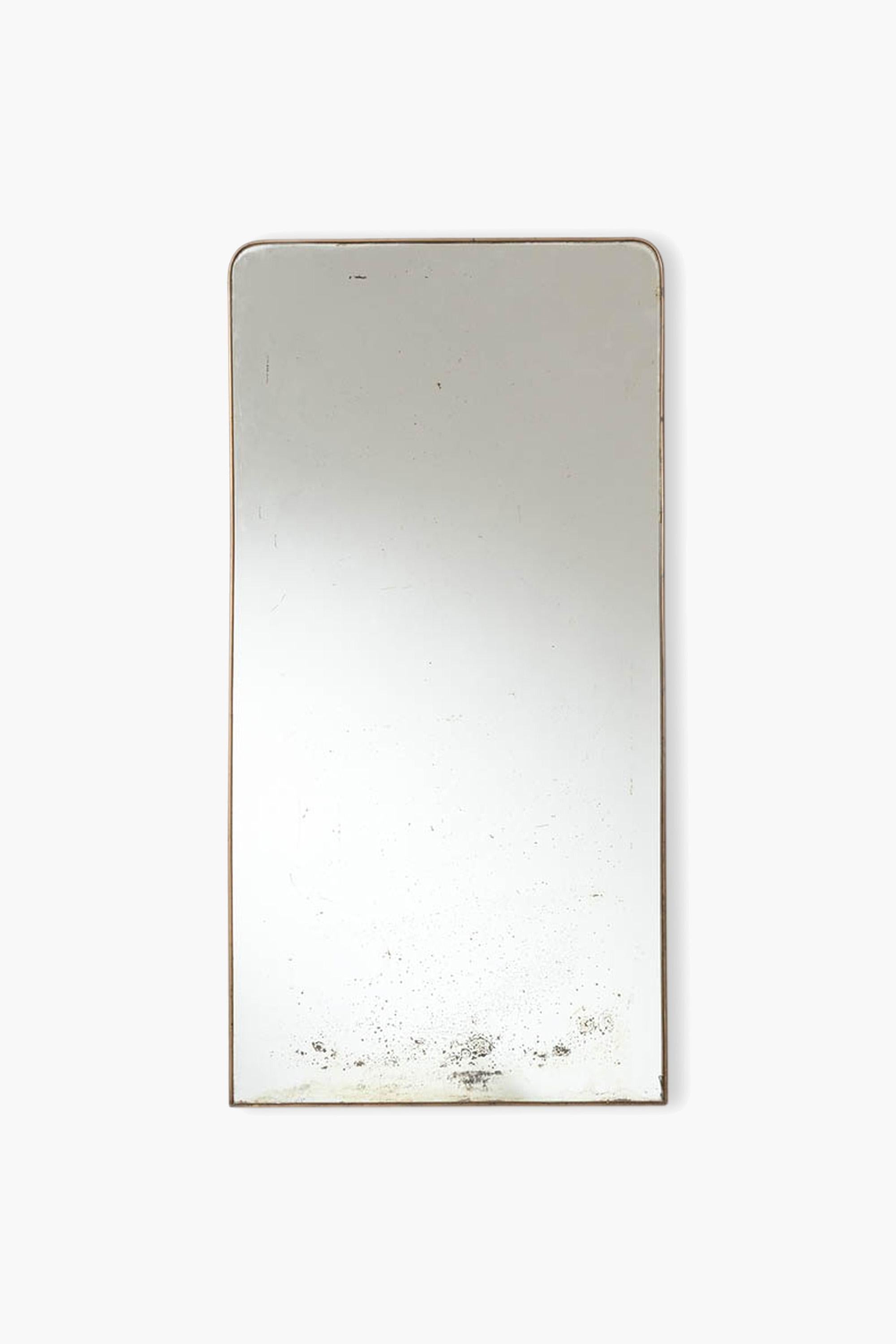 Large Italian Brass Framed Mirror, 1950s

A large 1950s Italian brass-framed wall mirror. Original foxed mirror plate with small losses - can be supplied with replacement new or faux-antique mirror plate if required.

Dimensions: H 121cm x W 51cm x