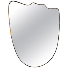 Grand miroir italien à bouclier en laiton