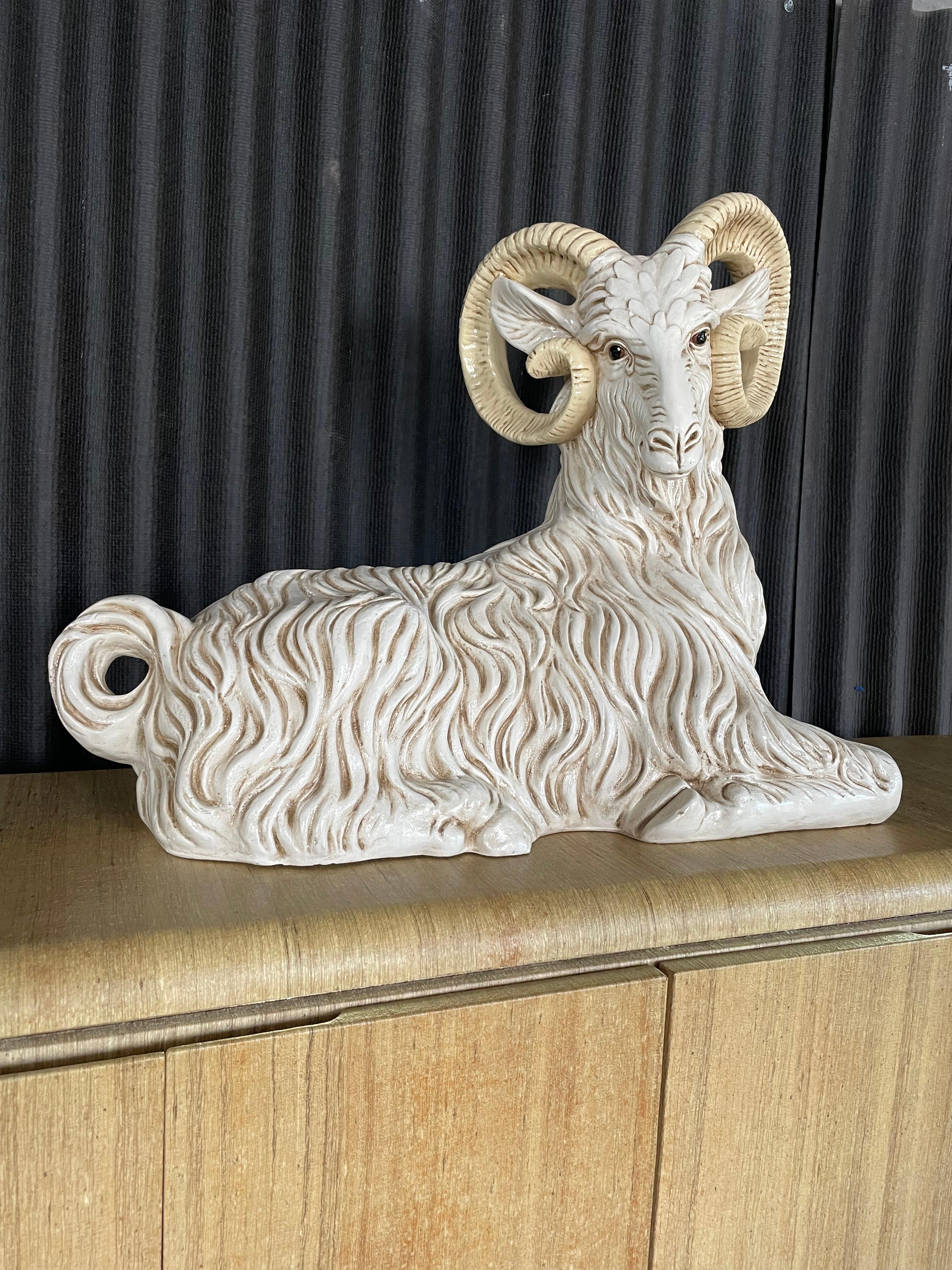 Large glazed ceramic ram sculpture.
Intricate design with gorgeous subtle coloring.
Piecing brown eyes.
No obvious chips or cracks.
Heavy piece.

28