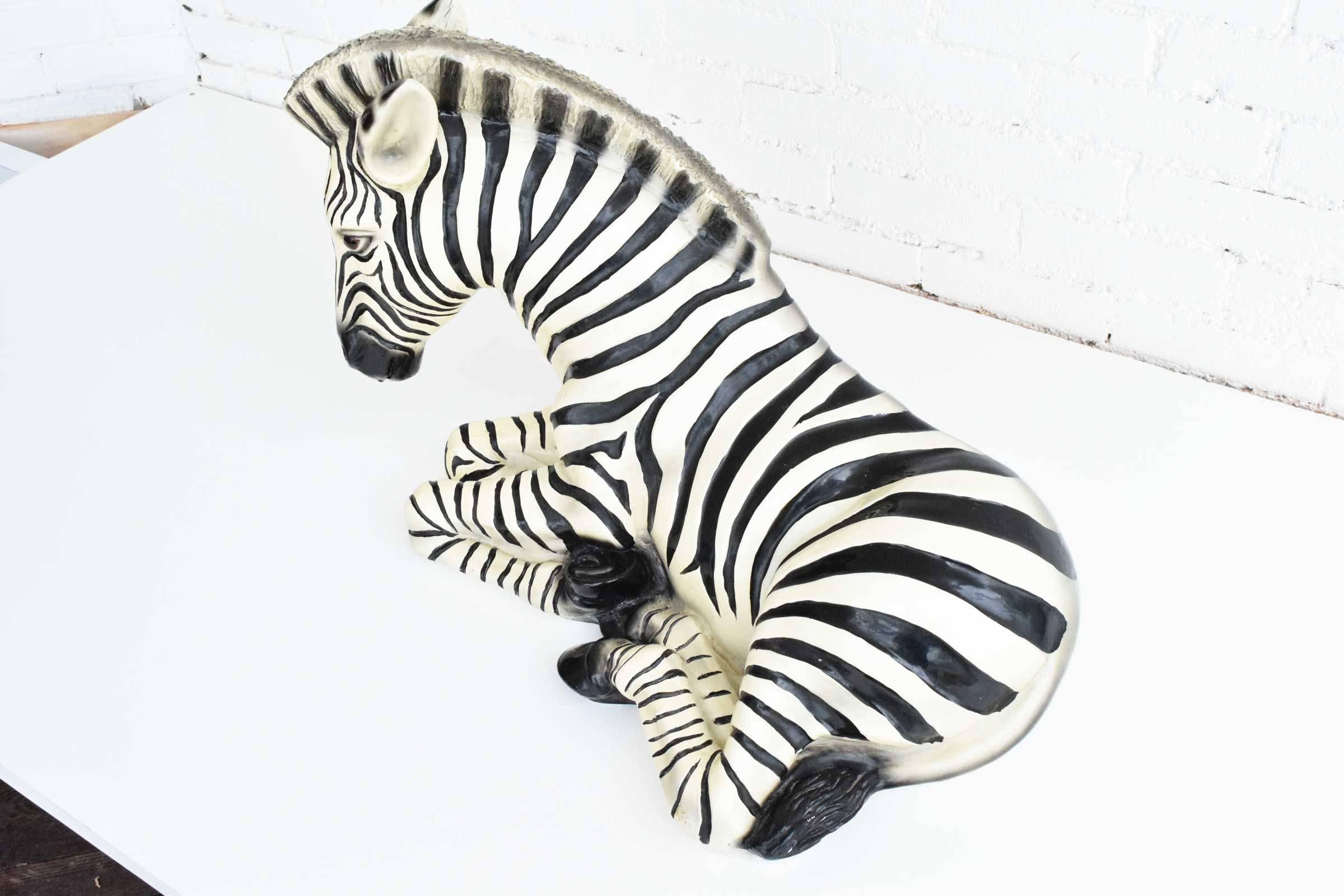 Graceful ceramic zebra, made in Italy. Stamped. Great for a coffee table, large shelf, console or dining centerpiece.
   