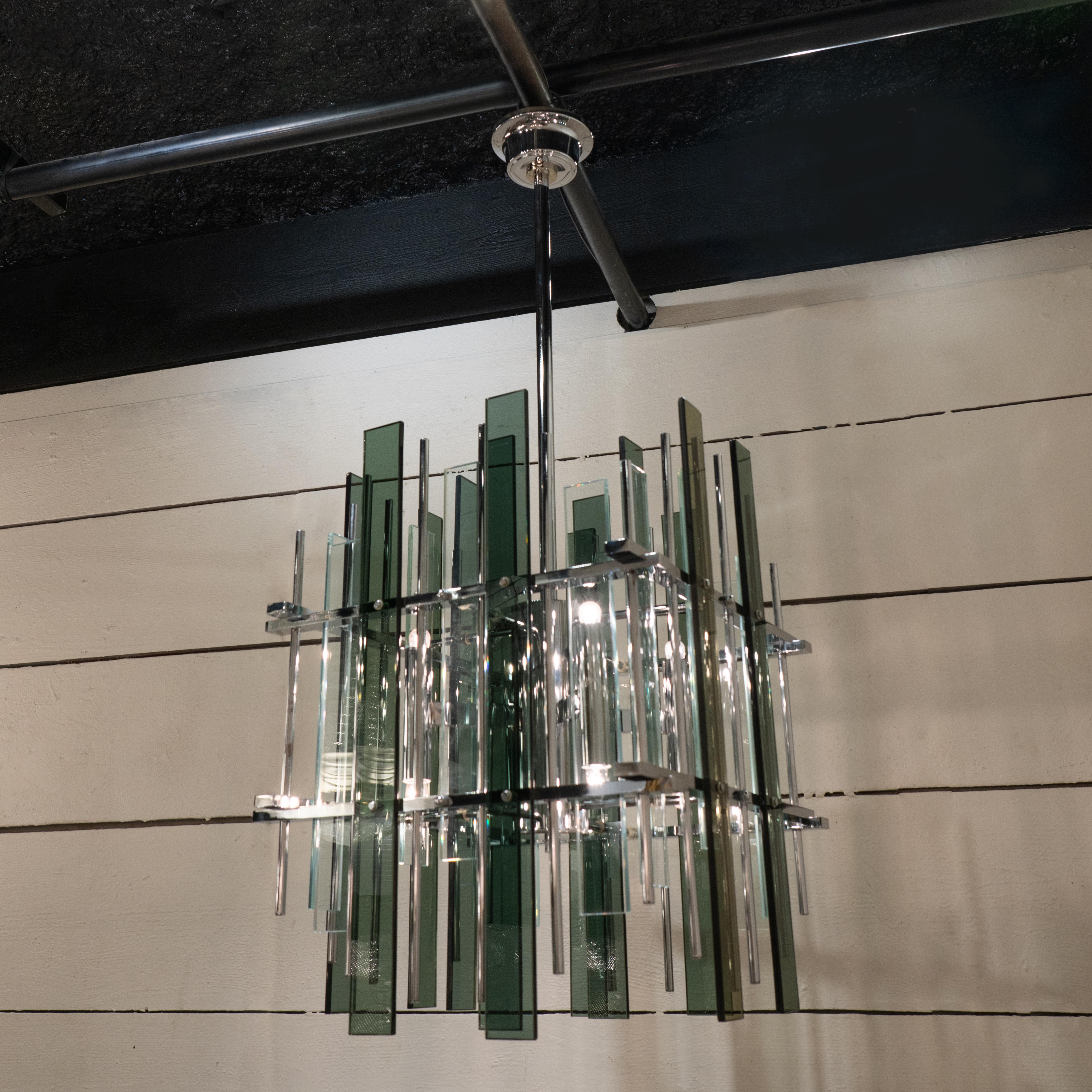 Large Italian chandelier of the 70s, chrome structure and smoked glasses.


Height 110 cm
Dimensions 45 x 45 cm
