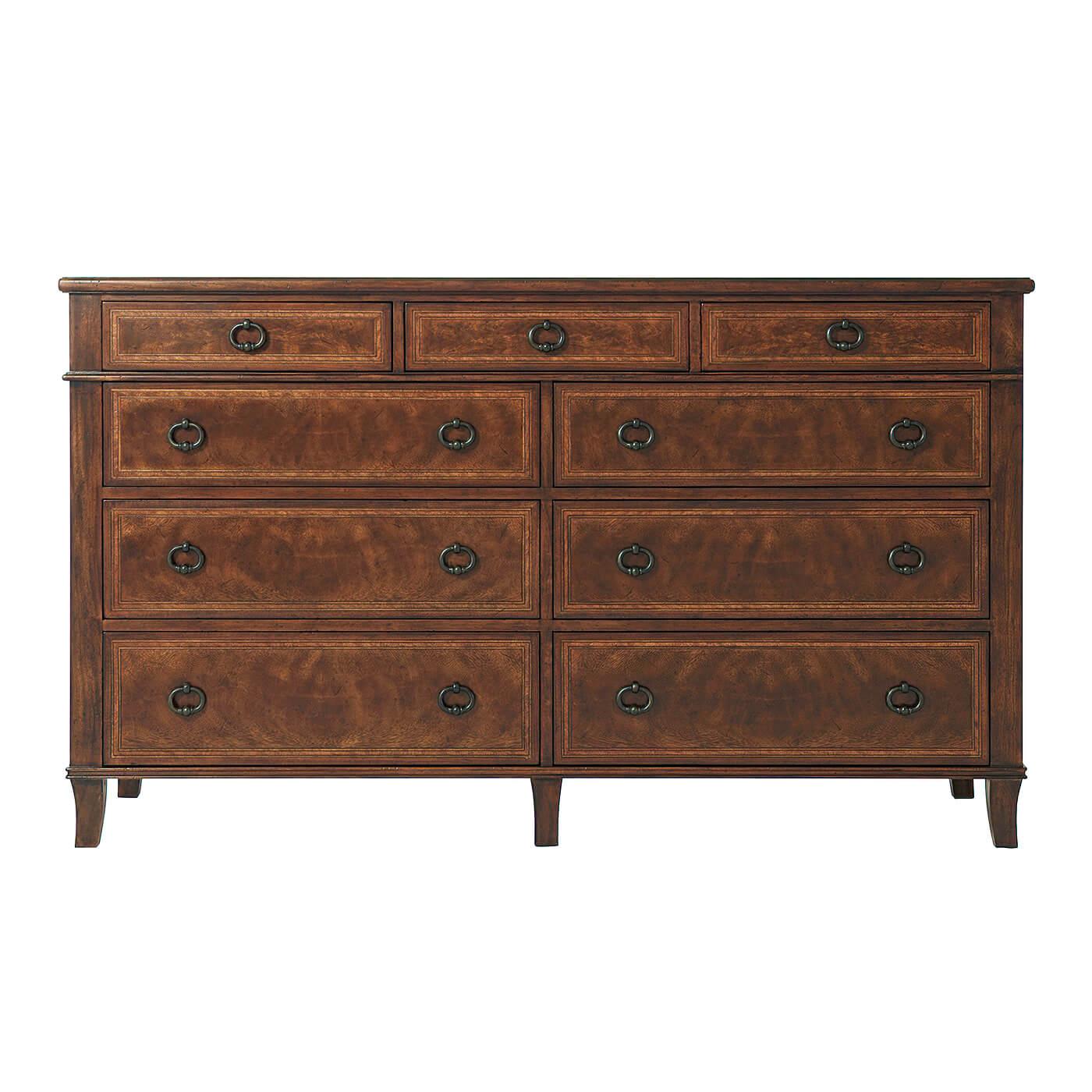 An Italian neoclassic style mahogany dresser, the rectangular cross-banded top above three short frieze drawers and six further long graduated drawers, on splayed legs. 

Dimensions: 60