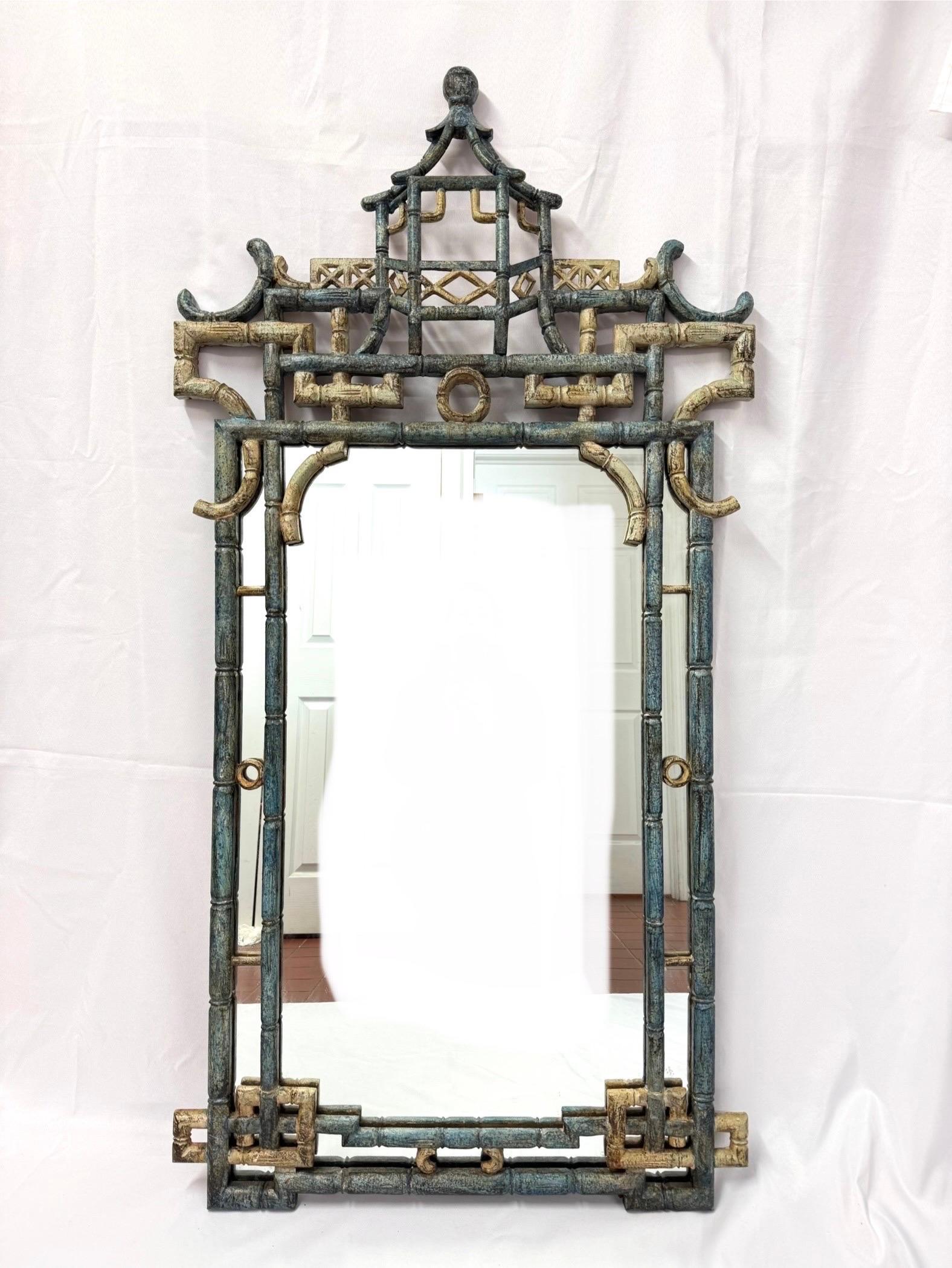 Large Italian Chinoiserie Pagoda Mirror. Perfect for that formal entrance. Gorgeous detail to this statement piece.  Shades of blue and cream. Would pop against a busy wallpaper. White glove delivery only. No parcel option. 
