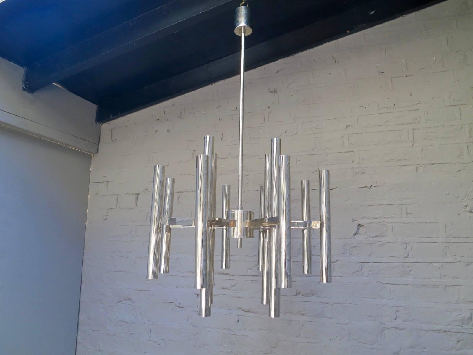 A large chrome chandelier by Italian designer Sciolari, with 12 arms and 24 light fittings.