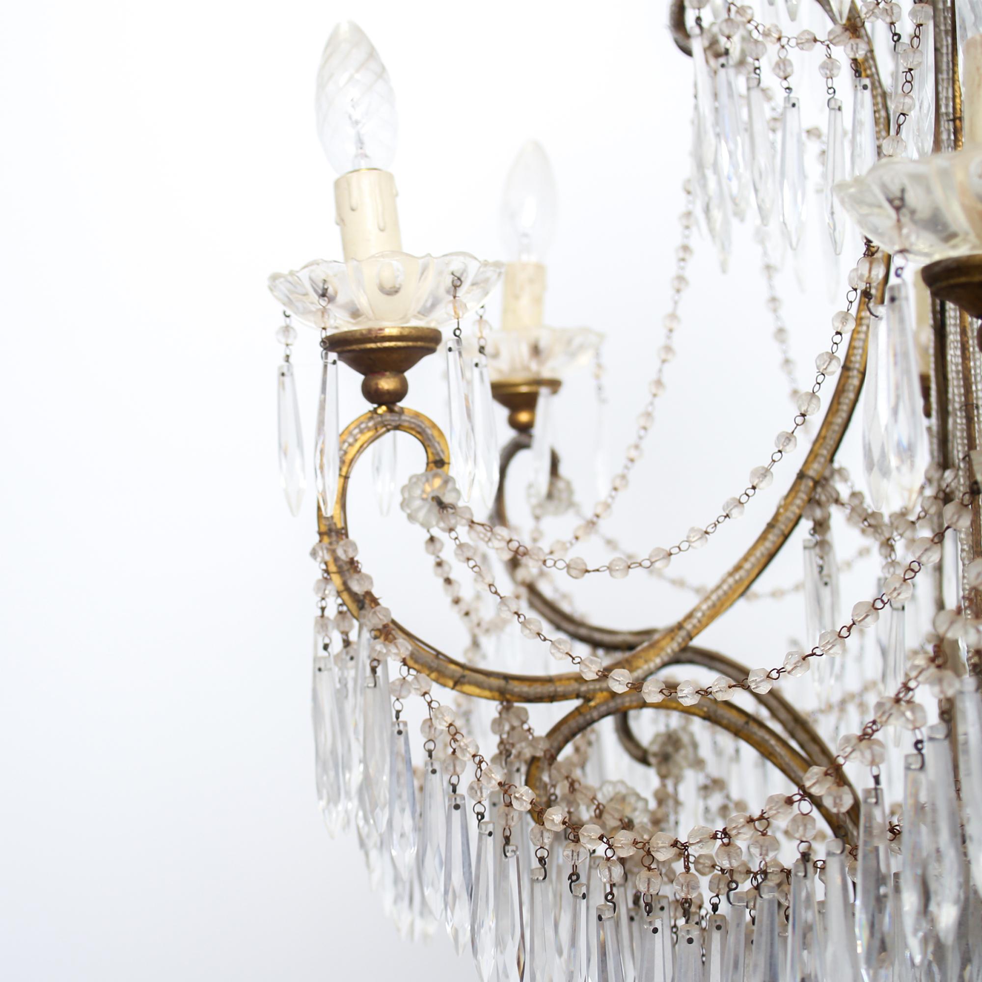 Beautiful crystal chandelier 1920 in good working conditions considering the age.