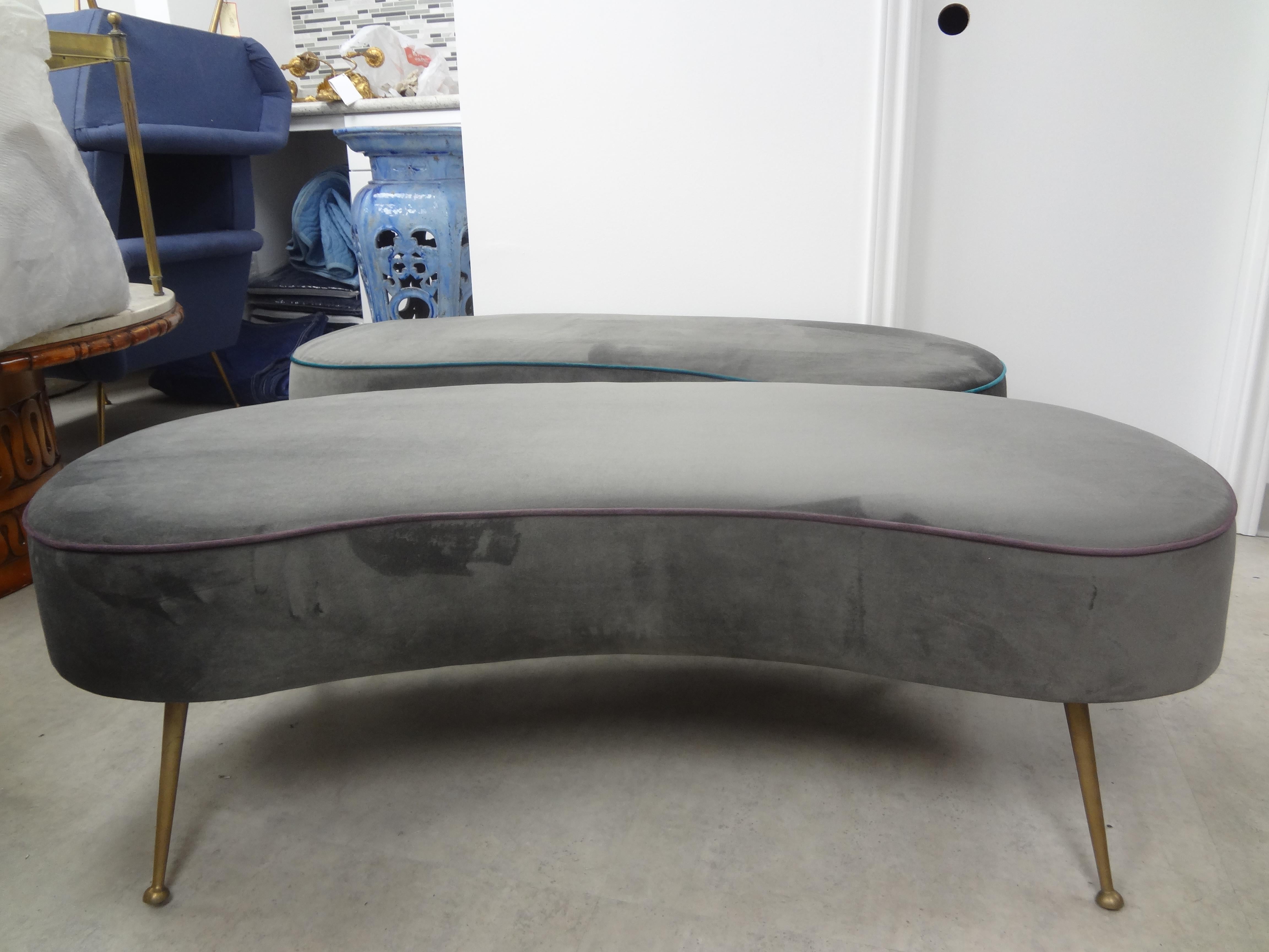 Large Italian Gio Ponti inspired curved bench with splayed brass legs. This stunning Italian modern curved bench with brass splayed legs is upholstered in gray velvet with magenta piping. Easy to re-upholster in the fabric of your choice. Perfect