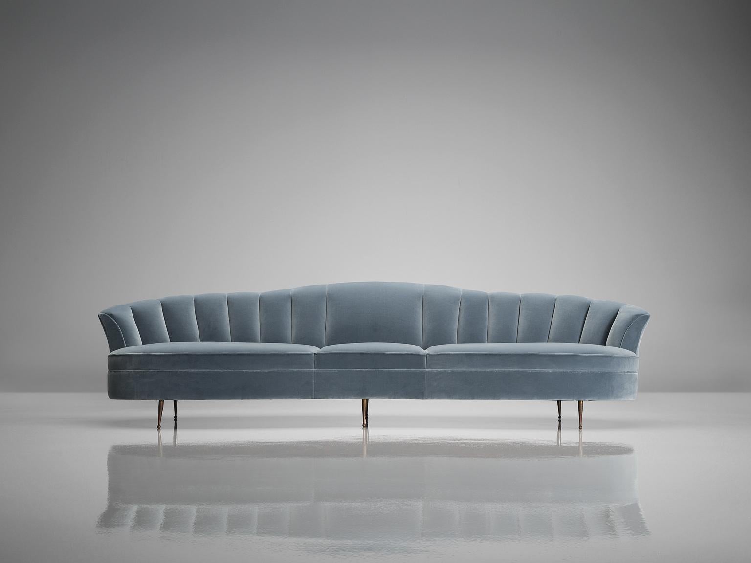 Large customizable sofa, fabric, brass, Italy, 1950s

Large sofa with elegant Italian design. The long sofa rests on brass legs. The seat is structured in three parts. With the rounded backrest that gets higher towards the middle and its design into