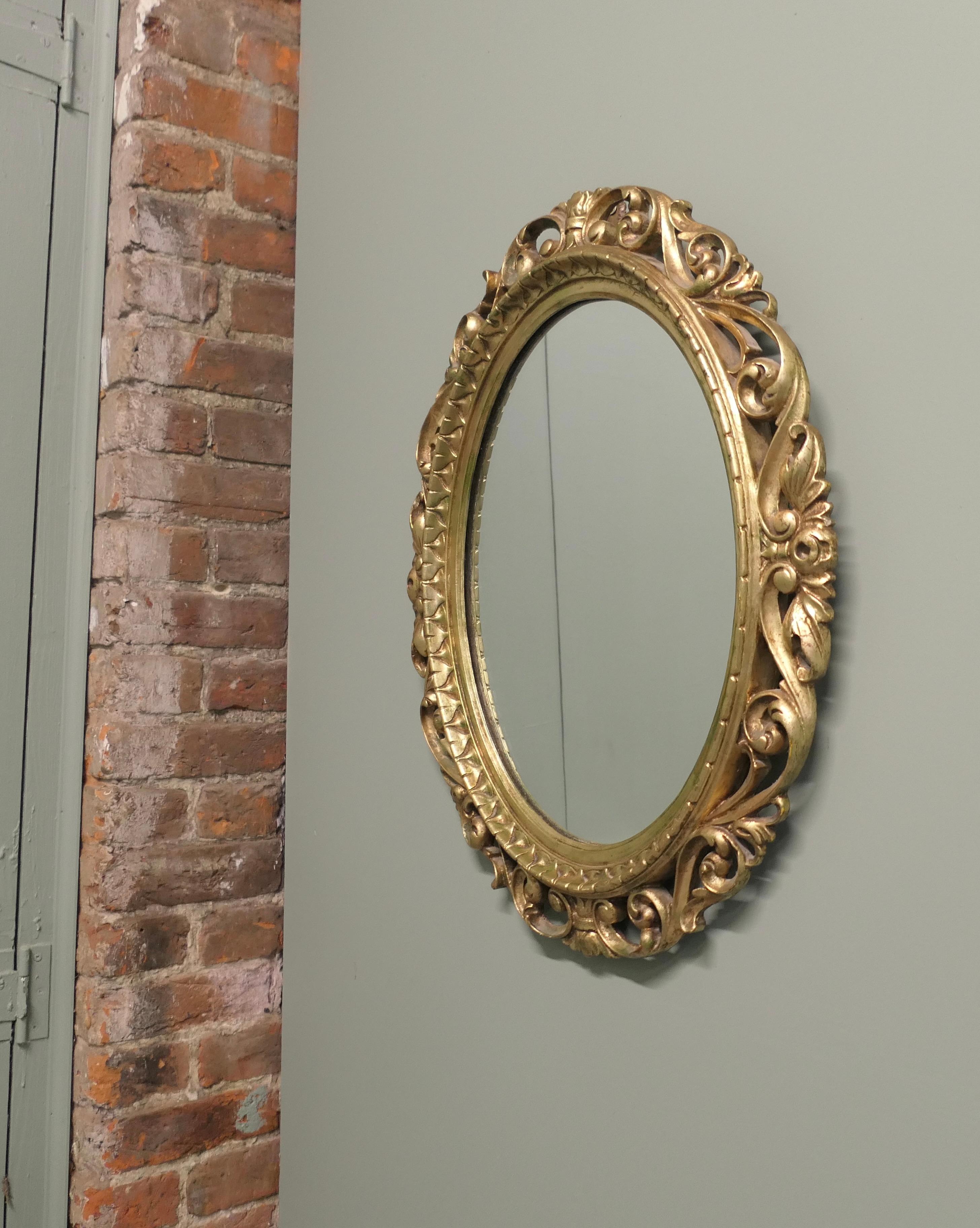 Mid-20th Century Large Italian Decorative Gilt Oval Mirror For Sale