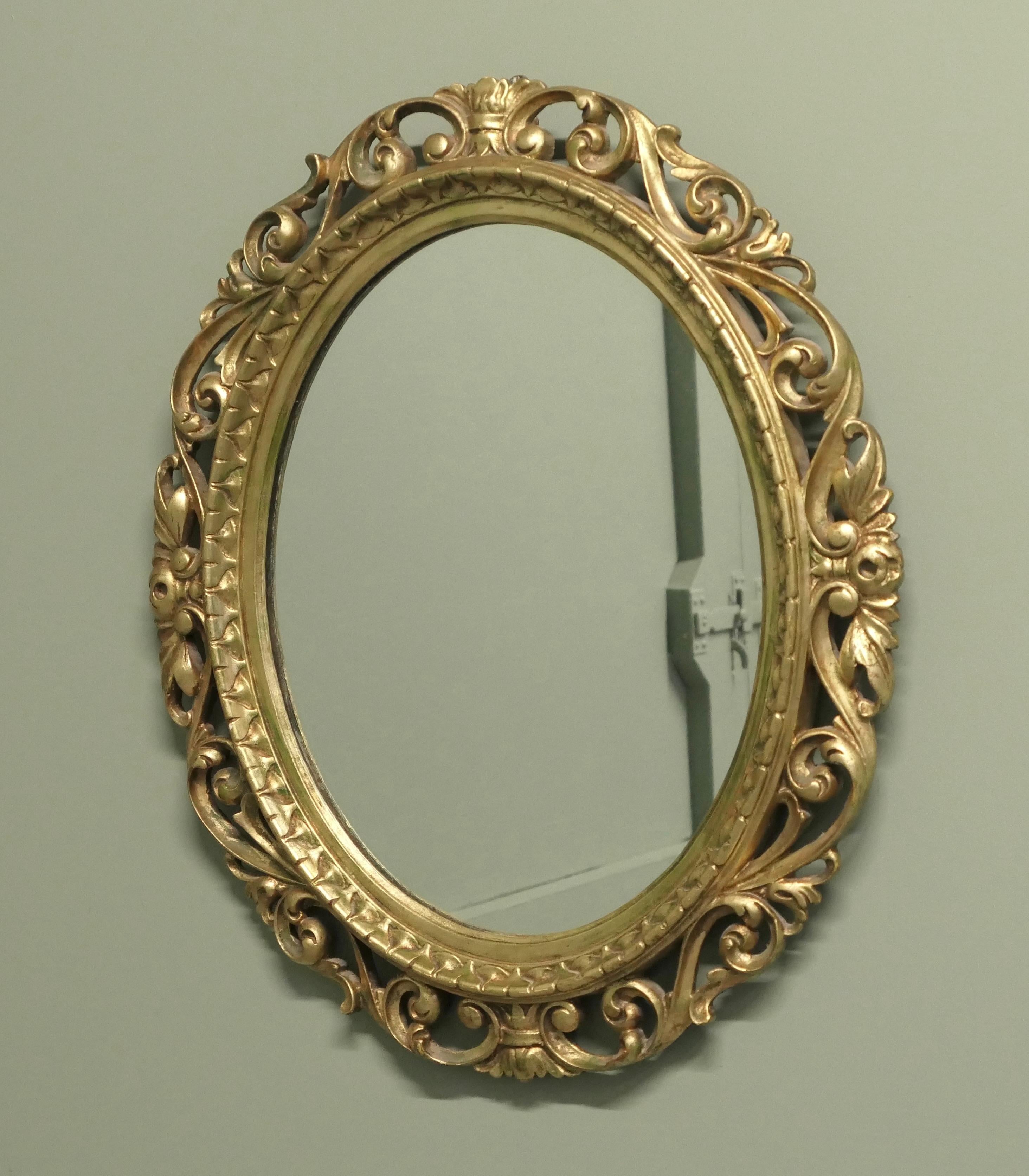 Giltwood Large Italian Decorative Gilt Oval Mirror For Sale