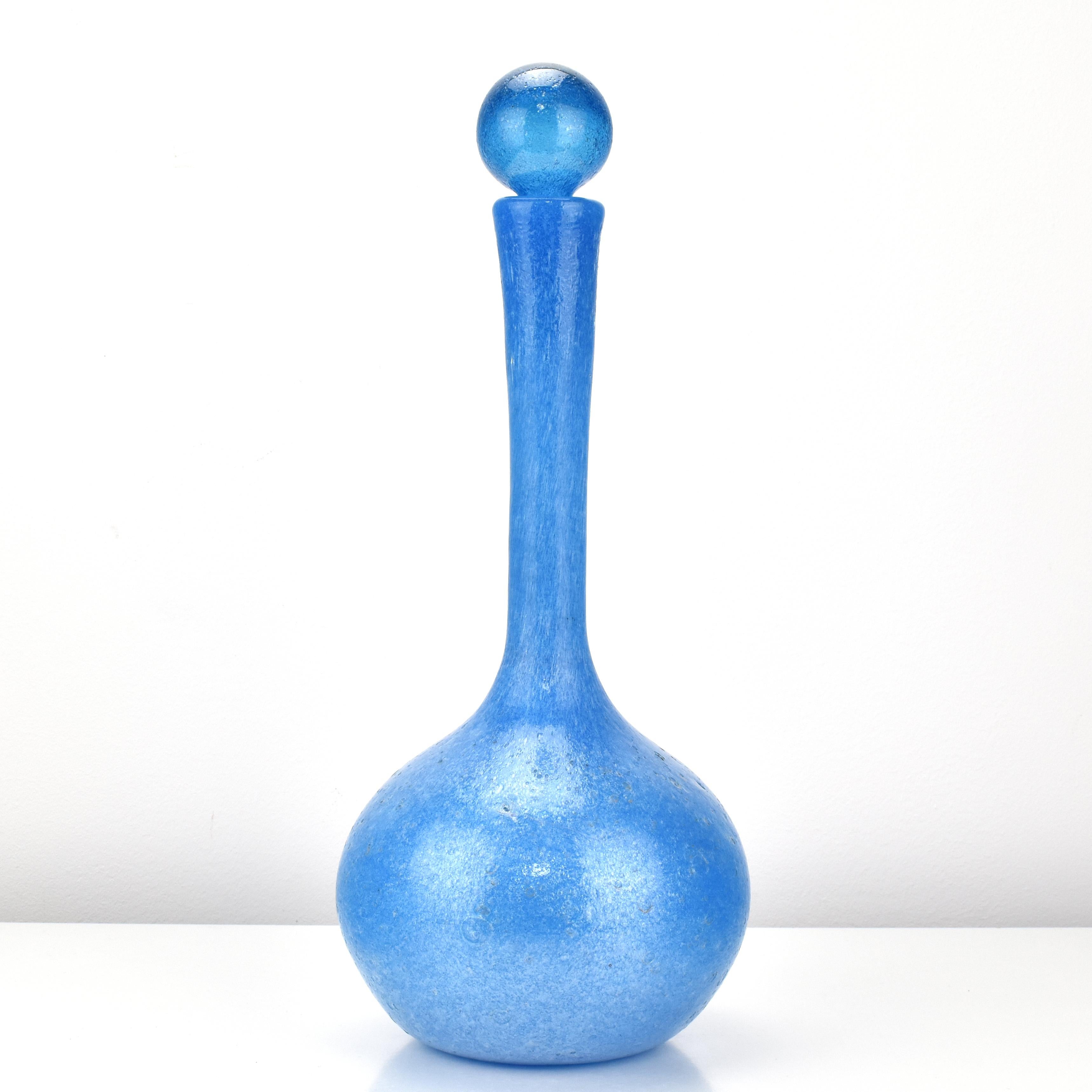 A highly decorative decanter carafe made of blue opaque art glass in 