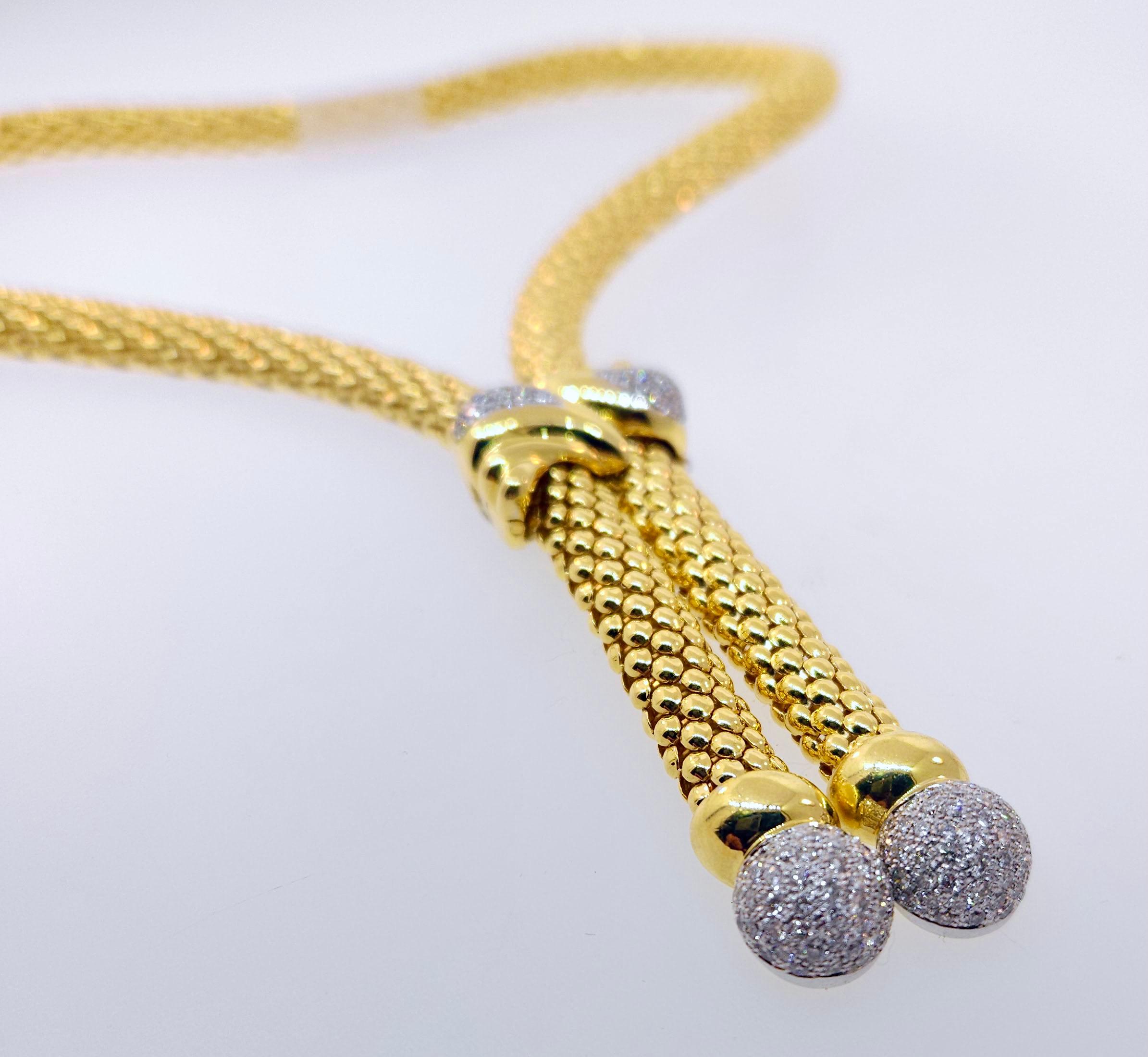 Thank you for viewing this beautiful 18k gold diamond lariat necklace.  The necklace weights 71.5 grams.  It contains diamonds weighting approximately 2.50 carats.  The diamonds on average are H color, SI clarity.  The length can be adjusted up to a