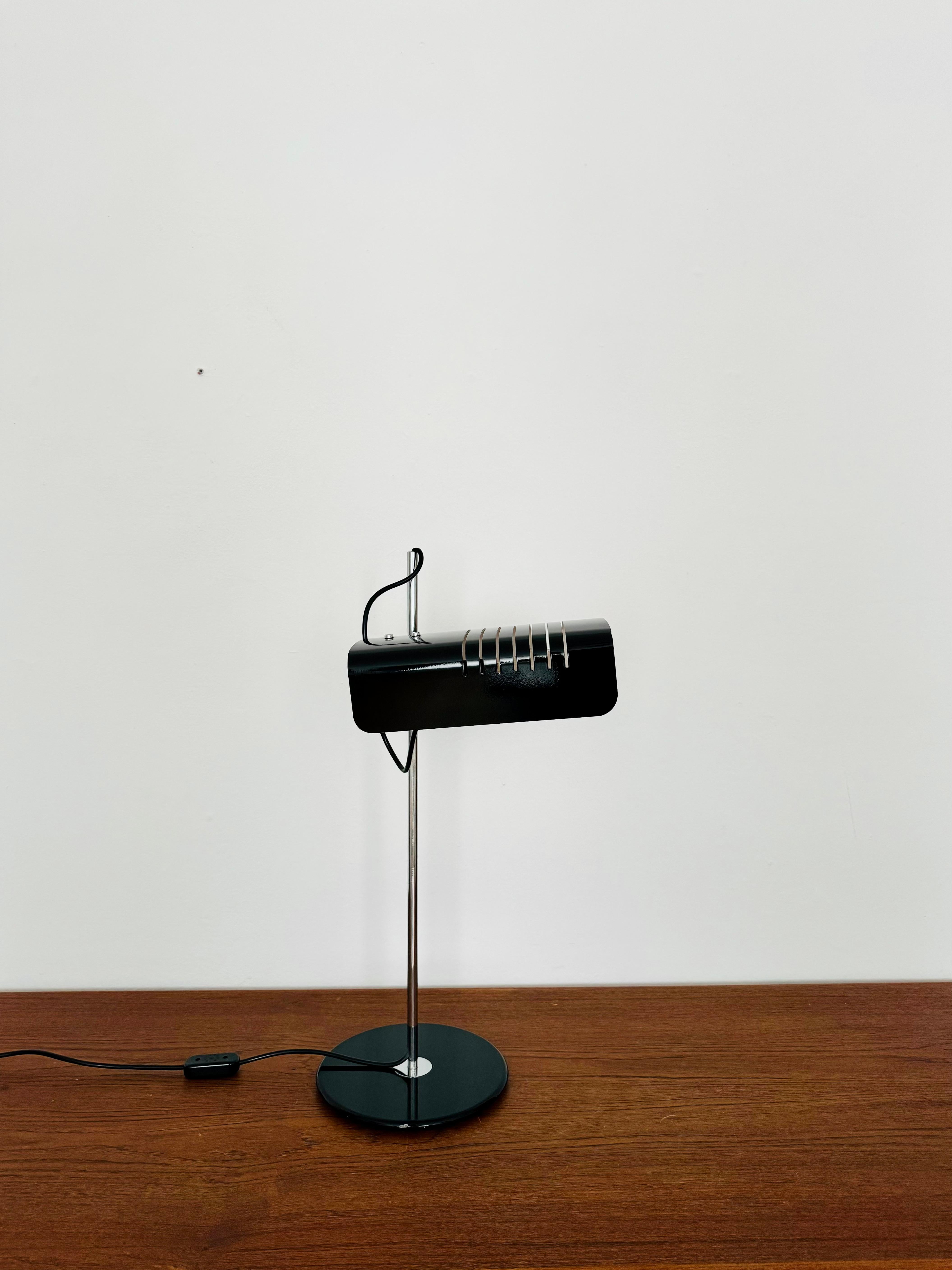 Fabulous Italian desk or table lamp from Joe Colombo from the 1960s.
Industrial design and high -quality workmanship.
An absolute highlight for every design lover.
There is a spectacular play of light.

Design: Joe Colombo

Condition:

Very good