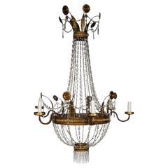 Grande lampadario Impero italiano in cristallo e tole dorate