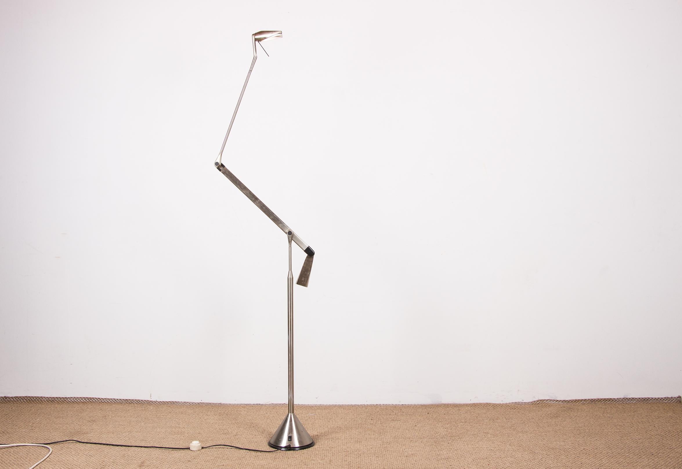 Superb large Italian modernist floor lamp. 
It has a unique balancing system with a counterweight that allows the lamp to always be placed in the desired position and used in a multifunctional way. 
The lamp switch and the light intensity regulator