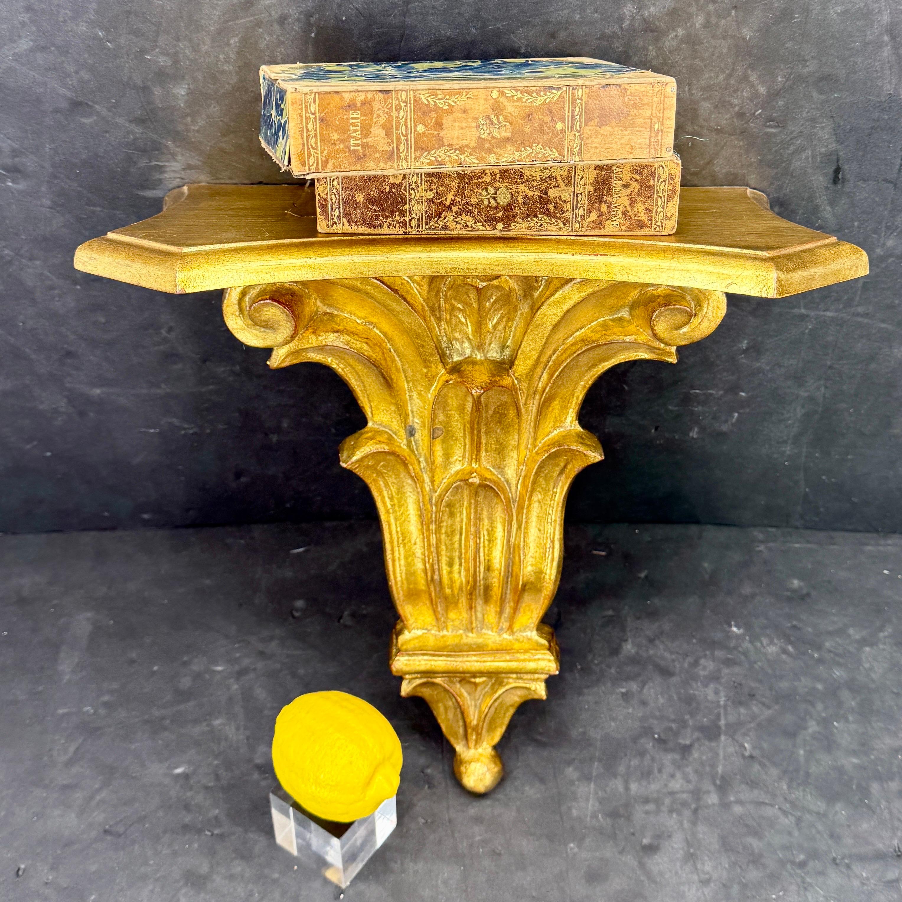 Gorgeous Italian Gold Leaf Wall Shelf. This bracket could certainly stand alone on a wall or functional to hold a treasure on top. Wonderful classic addition to any living room, dining room or bedroom setting.  Stamped, Made in Italy, on the back.
