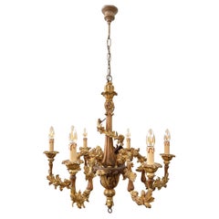Grand lustre baroque italien Florentine, en bois sculpté doré, à six branches