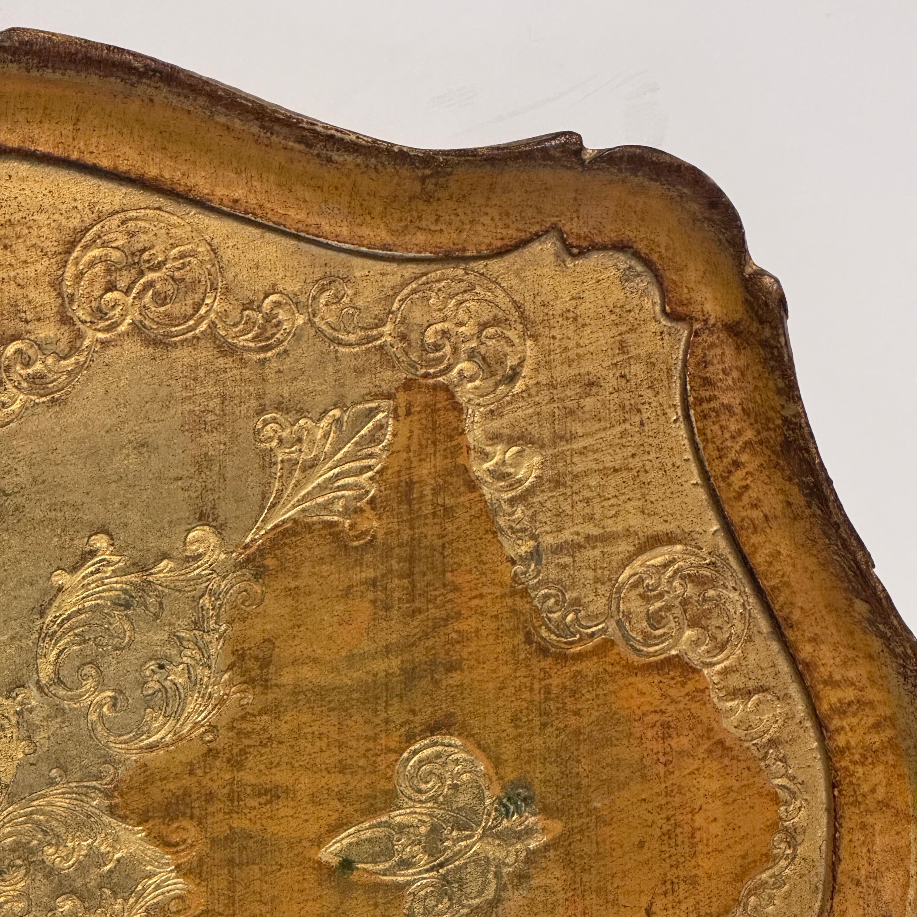 Stunning large wood Florentine tray from the 1960’s. These highly collectable pieces are both form and function. These look wonderful sitting alone or in groupings on a coffee table. Functionally they can be used on a Mid-Century bar cart, vanity