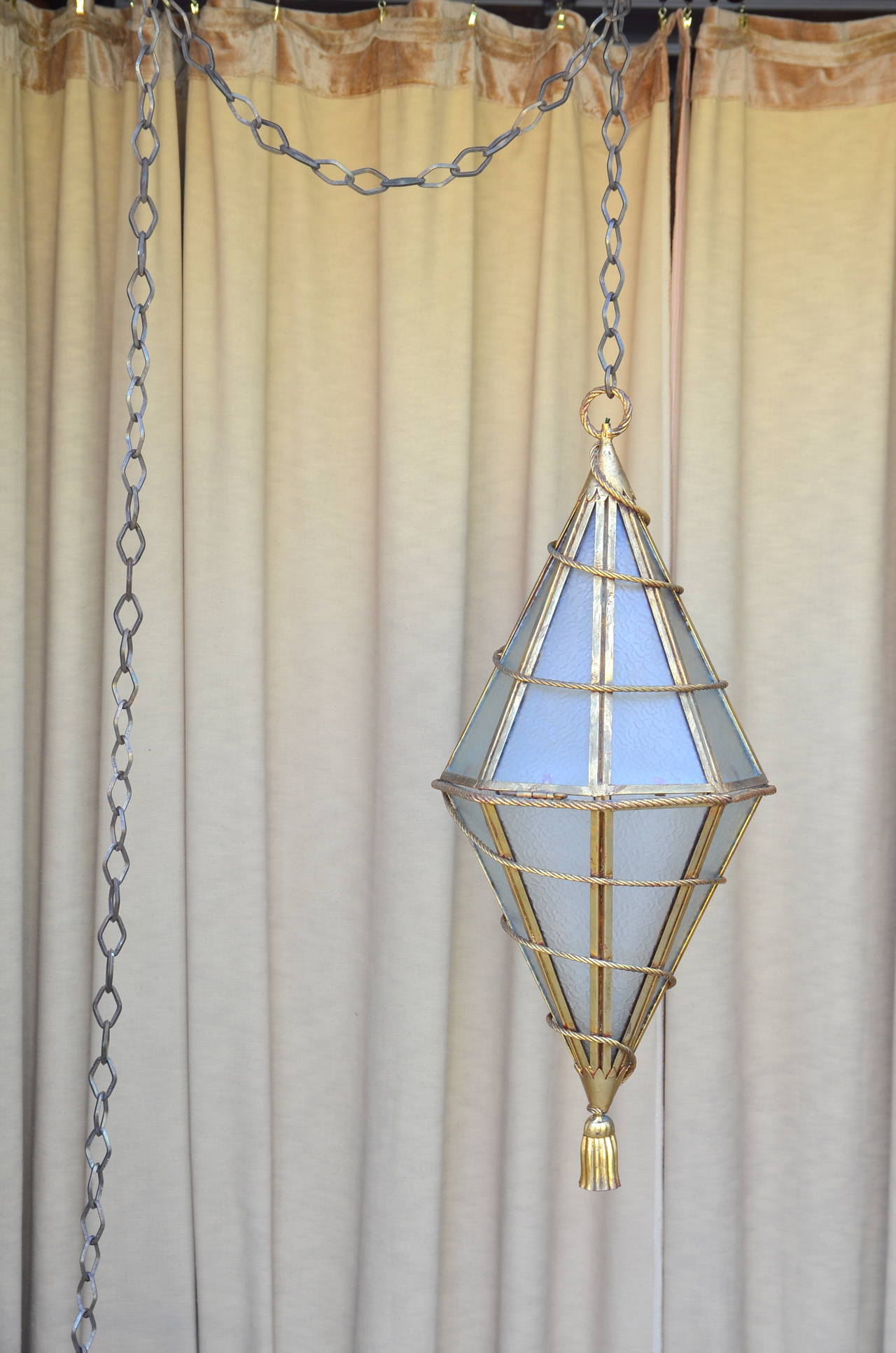 Spectacular Italian gilt metal geometric hanging lantern. Comes with extra-long (12 feet) custom chain.