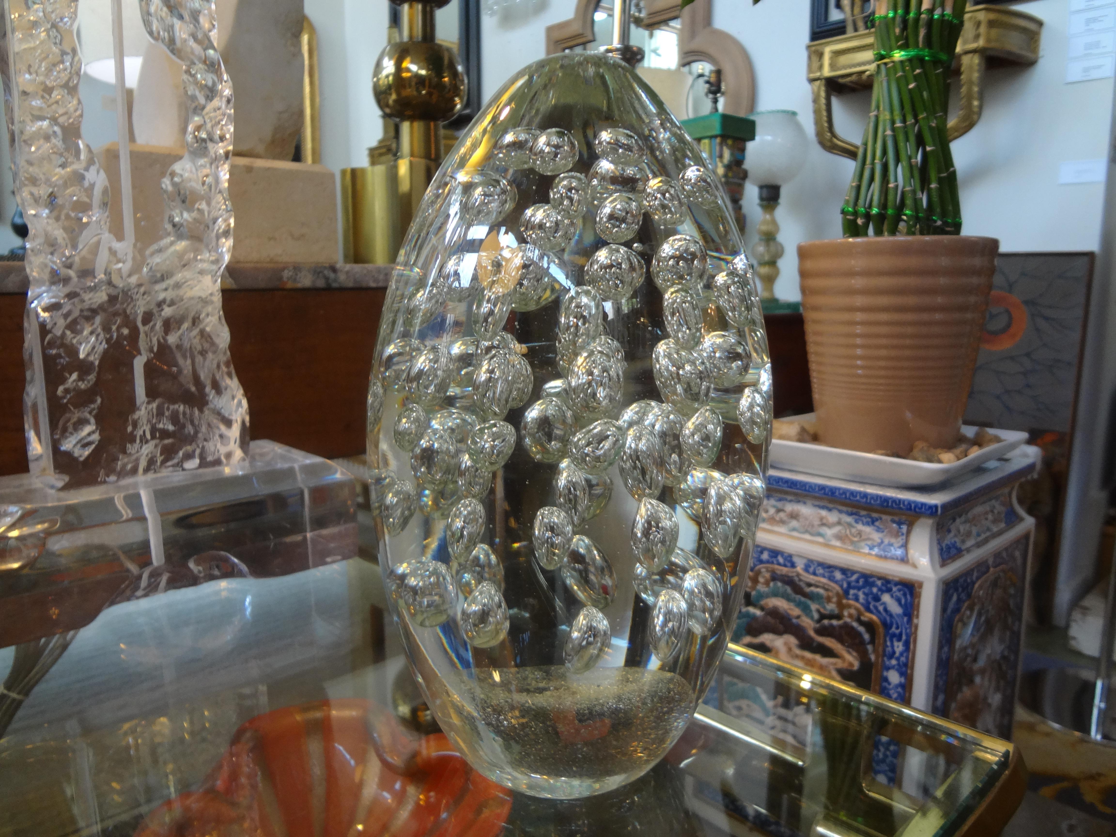 Large Italian glass egg or crystal egg with controlled bubbles attributed to Barbini. This stunning Italian crystal or Murano glass egg shaped sculpture is beautiful from every angle. Our Italian crystal egg is a great coffee table or bookcase