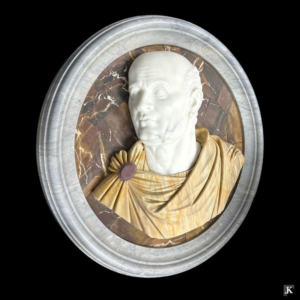 Large heavy, approximately 300 pound, Italian Grand Tour Style Mixed Marble Round Emperor Wall Plaque. This plaque depicts the Roman emperor Vespasian. The mixed marble refers to a combination or marbles from differing regions and was believed to