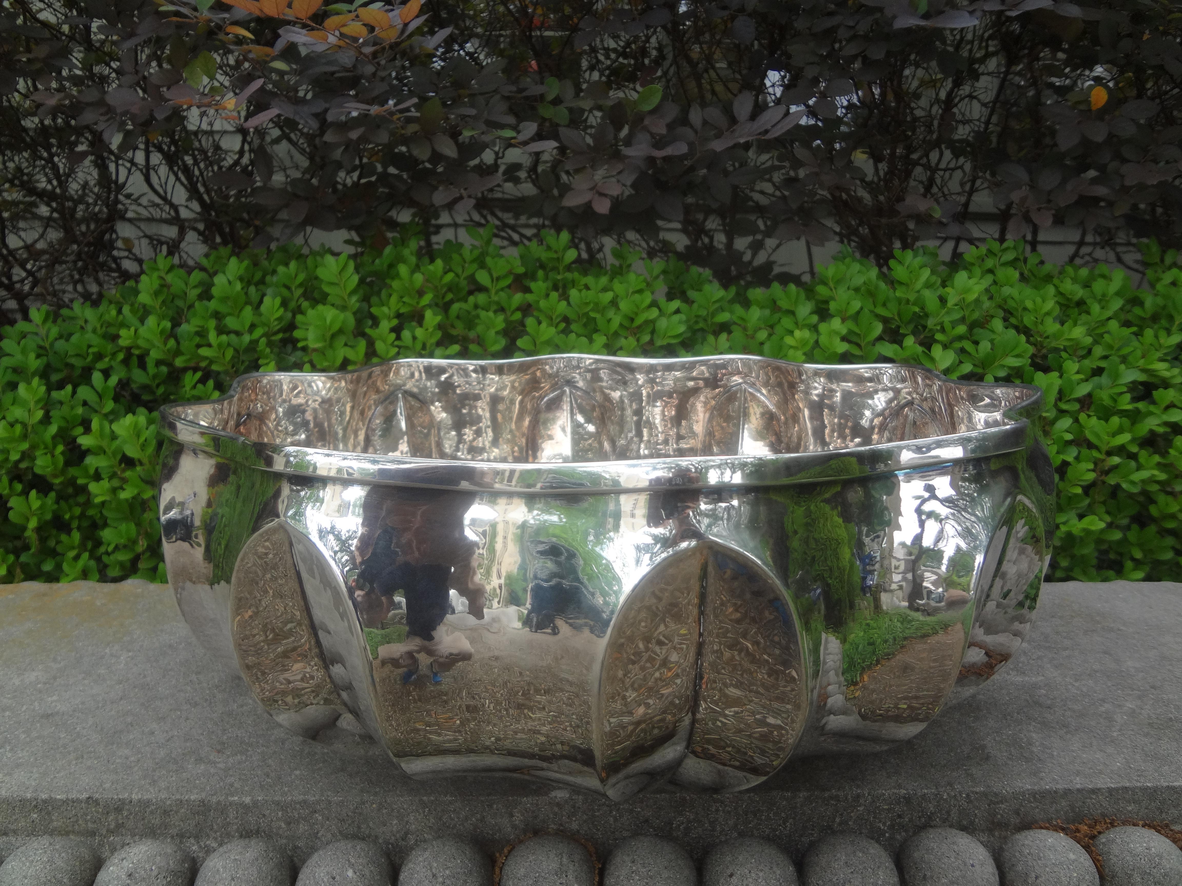 Large Italian hand hammered silver plated bowl. This lovely hand made Italian silver plated bowl has a scalloped modernist or Art Deco design with a hand hammered finish. This beautiful decorative bowl would make the perfect centerpiece on a dining