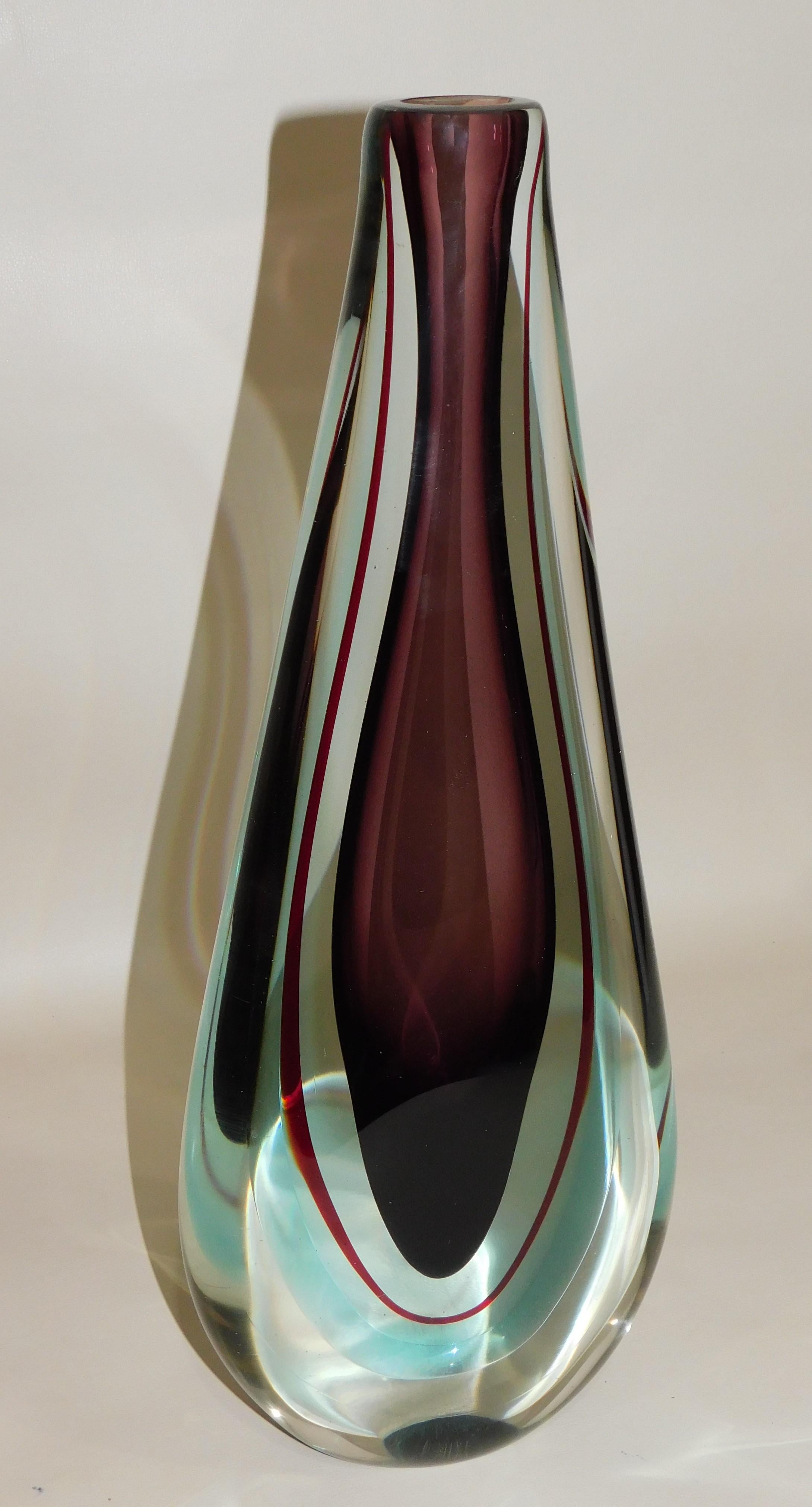 Large and beautiful midcentury Murano Italy hand blown reddish brown and blue/teal toned encased in a thick clear glass overlay art glass flower vase. Attributed to designer Archimede Seguso, circa 1960. Measures: 16.5 inches high.
