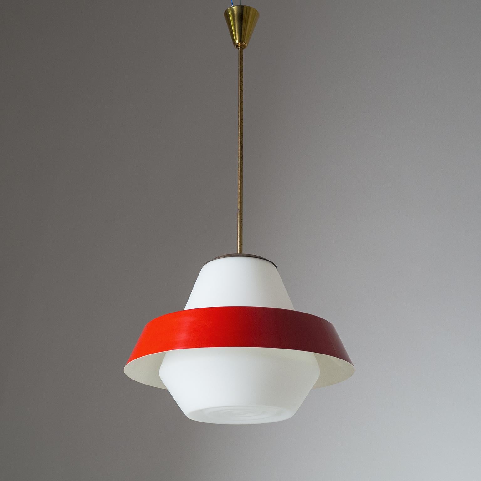 Large Italian midcentury lantern or pendant with a big satin glass diffuser and a red lacquered aluminum shade. The unusual glass has a double conical shape with a concentric rings structure on the bottom. Very nice original condition with minor