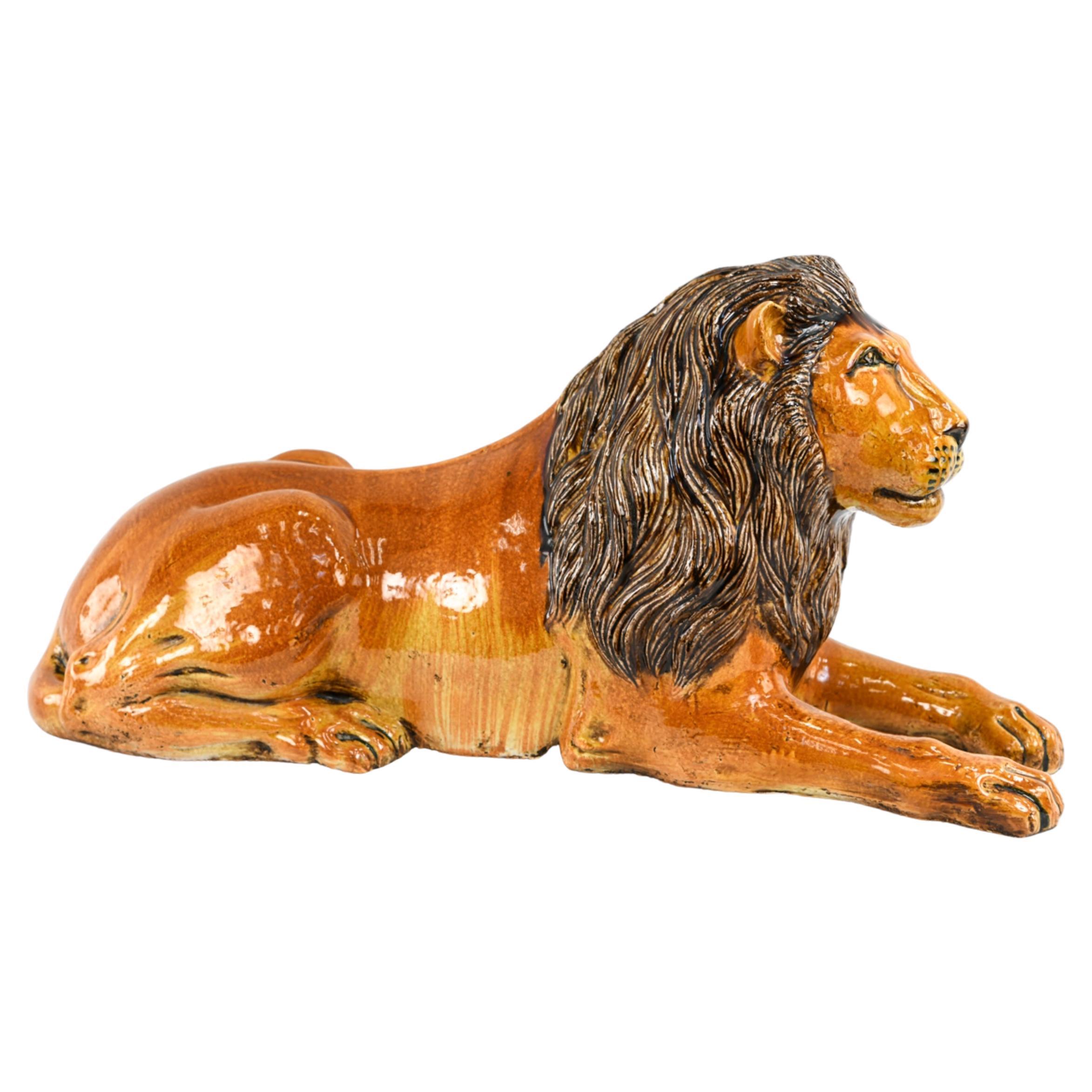 Large Italian Majolica Pottery Recumbent Lion Sculpture For Sale