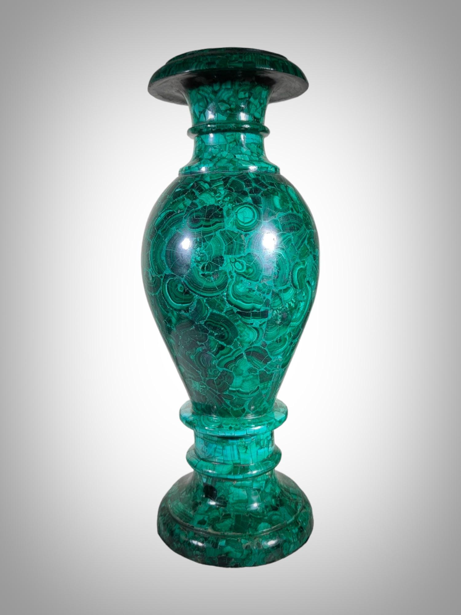 This impressive Italian malachite jar from the 80s is a verdadera made by a master of craftsmanship and design. Exhibiting a rich and exuberant tone of malachite green, this piece is a testimony to artistic skill and the attention to detail that