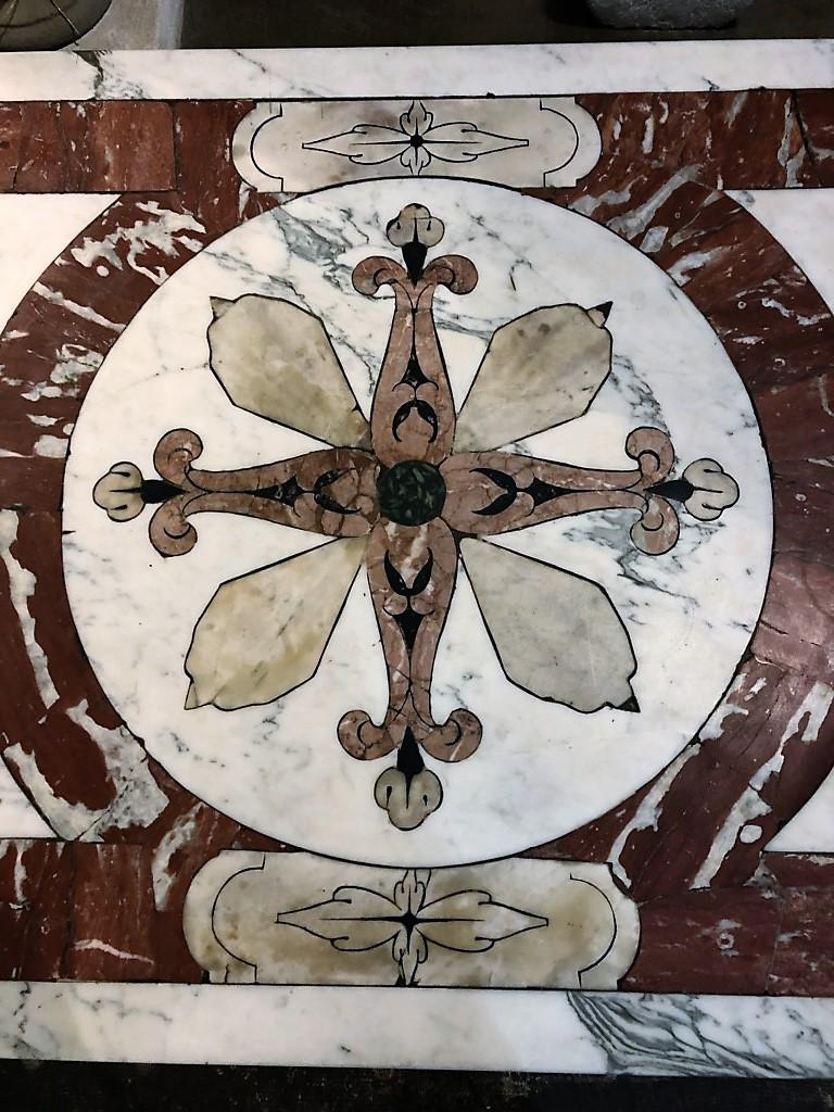 This beautiful inlaid marble coffee table top was handmade in the heart of Italy. The marble tabletop is of early 19th century resting atop a Kim Moltzer-designed iron base. Marble top is circa 1820 on a Kim Moltzer midcentury base. 

Origin