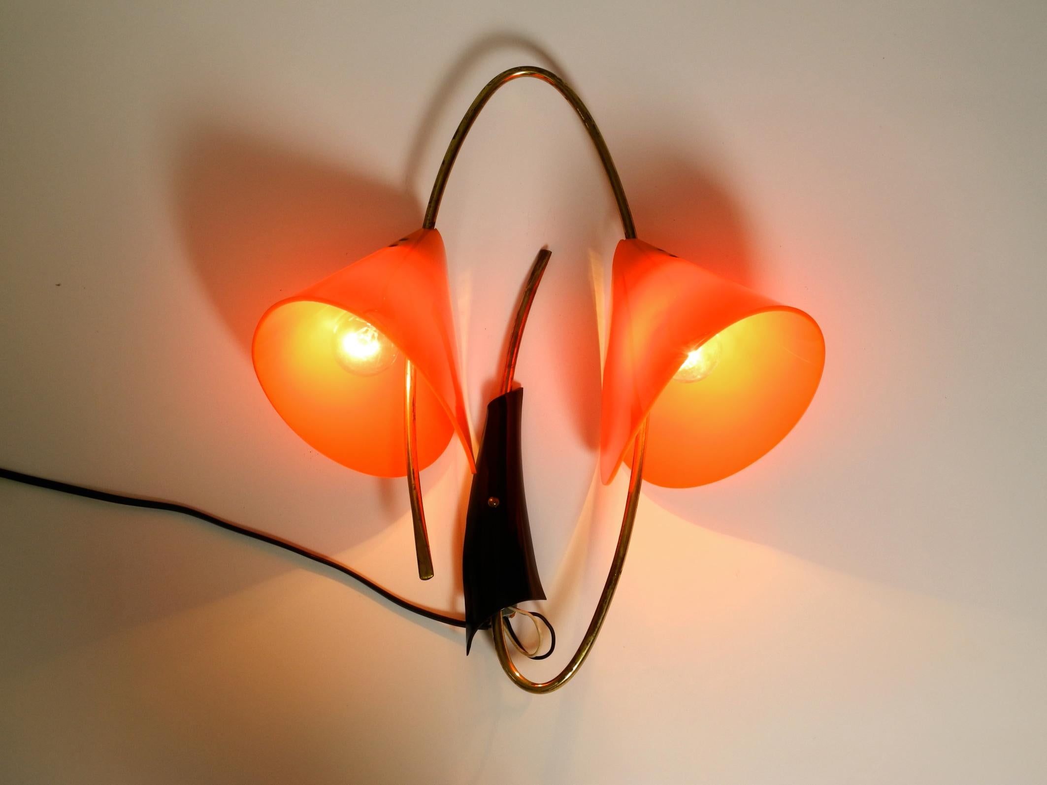 Mid-Century Modern Large Italian Mid Century brass wall lamp with orange acrylic glass shades For Sale