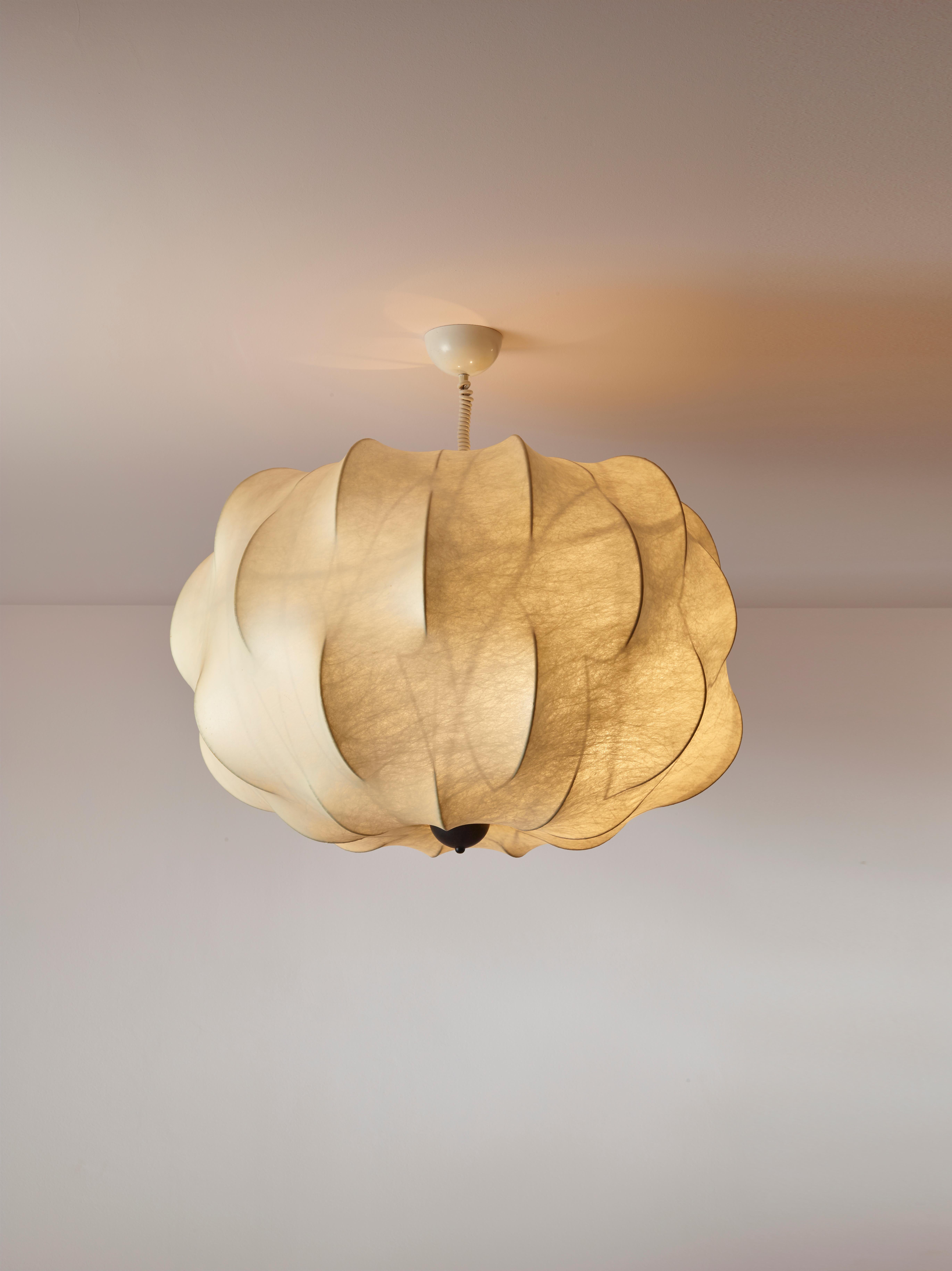 A large cocoon Nuvola chandelier by Tobia Scarpa for Flos designed in the 1962 and crafted in the early 1970s.

In the realm of mid-century modern design, few pieces encapsulate the era's essence quite like the Nuvola pendant light by Tobia Scarpa