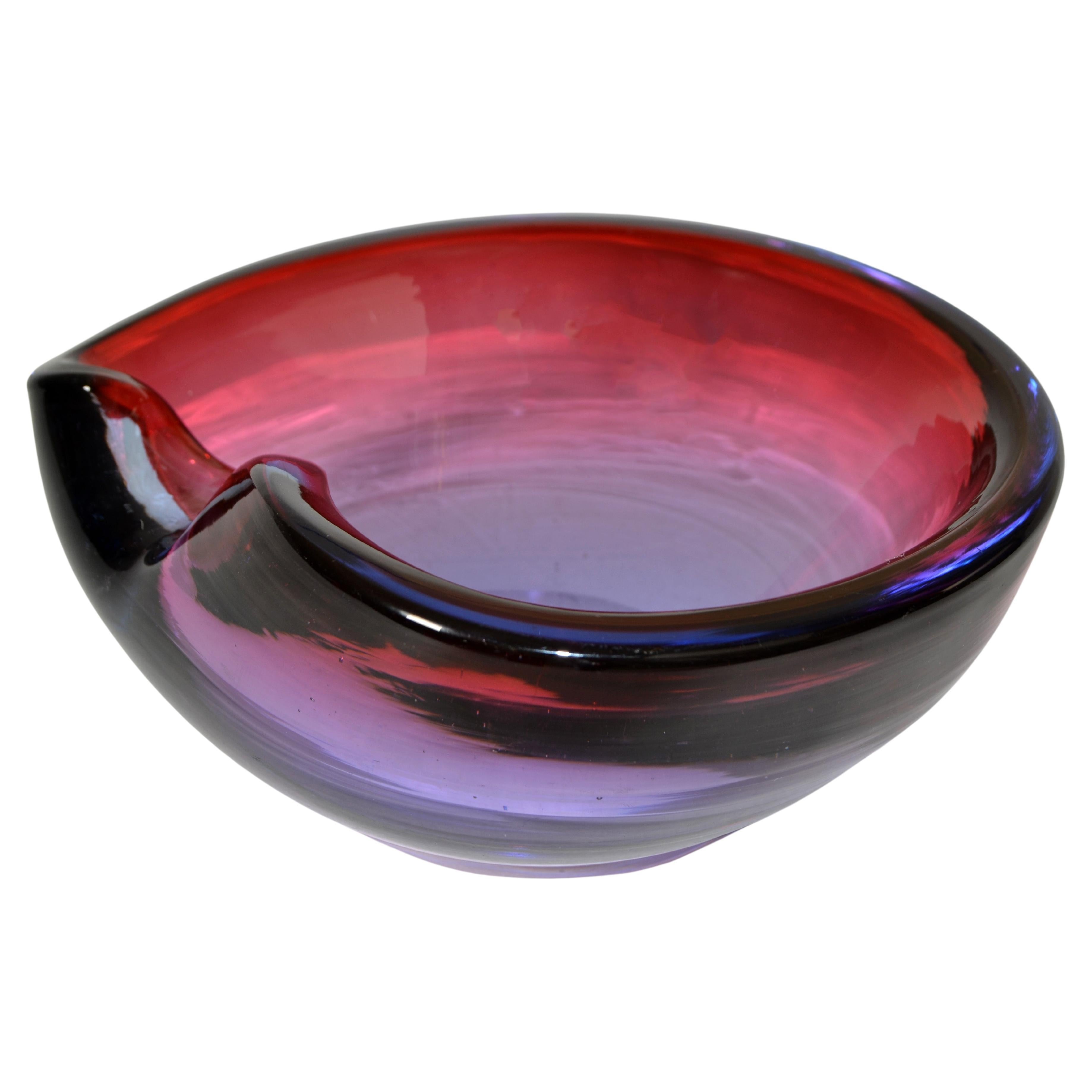 Elegant Italien sculptural hand-blown Murano art glass decorative bowl, Ashtray in dark pink, blue, and clear tone.
The bowl is very heavy.
Simply lovely on Top of the Hallway Entry Console, Dresser in the Bedroom, Shelving Unit or Living Room Side