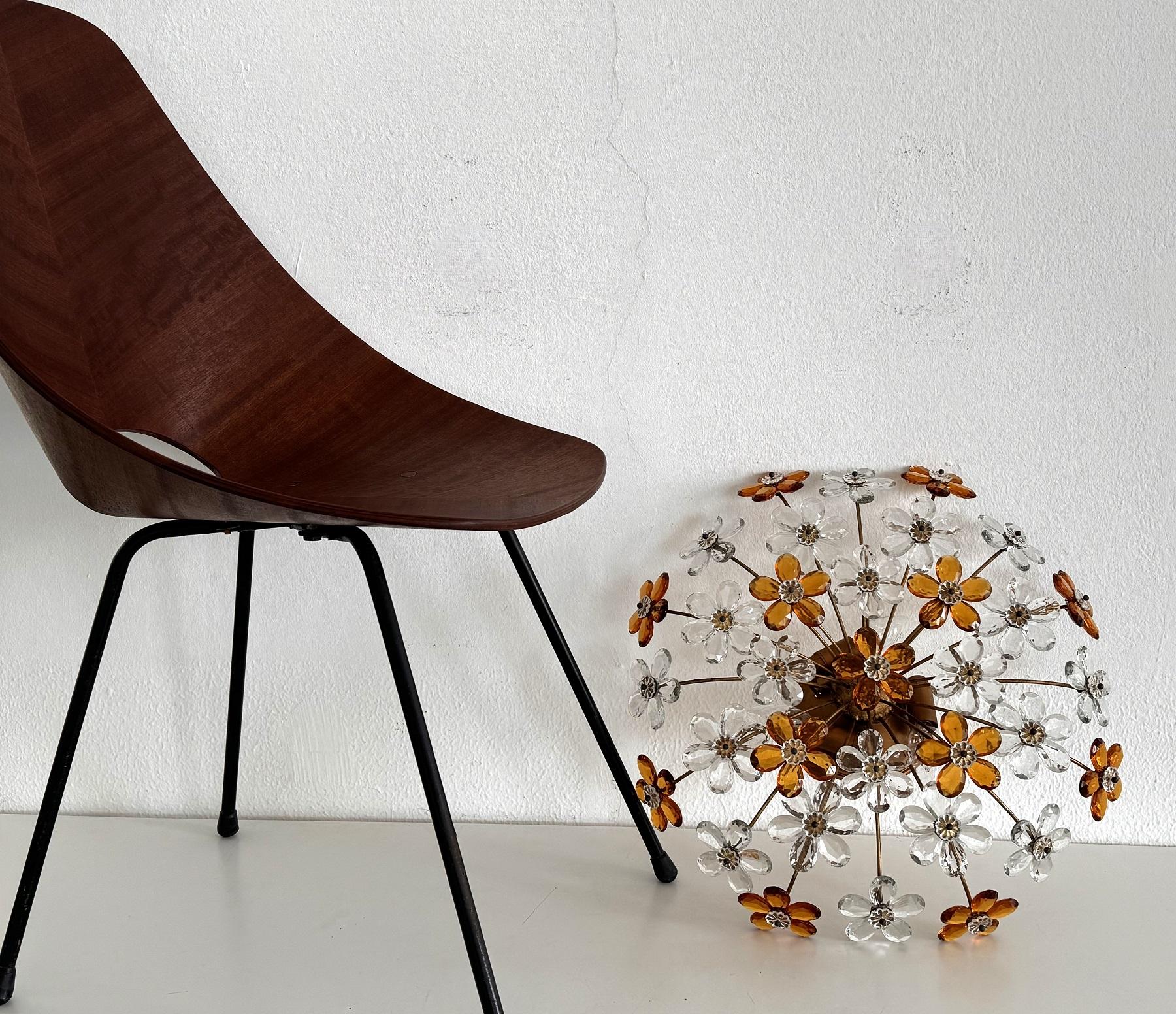 Large Italian Midcentury Florentine Crystal-Flower Flush Mount Chandelier, 1950s

A lavish Italian Florentine flush-mount chandelier decorated with 32 pcs. big crystal flowers composed from single Murano crystal glass drops an transparent and amber