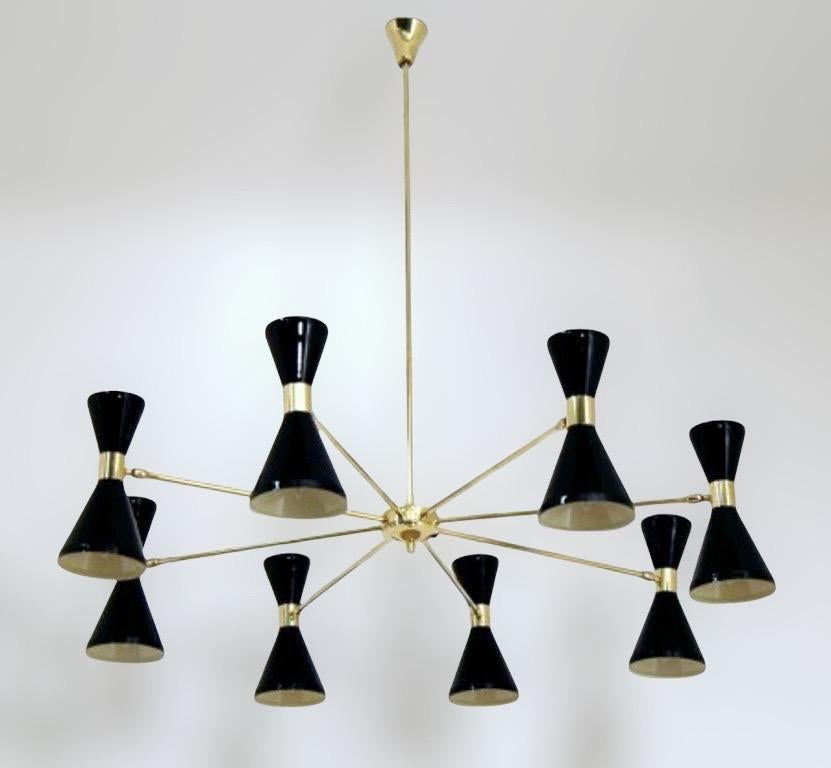 Large 8-arm round chandelier shown in un-lacquered natural brass with black enamel fabricated in Italy by Fabio Ltd. 

The cones are a vintage 1950s Italian design. The wide band and distinctly beveled edge make a strong design statement and an