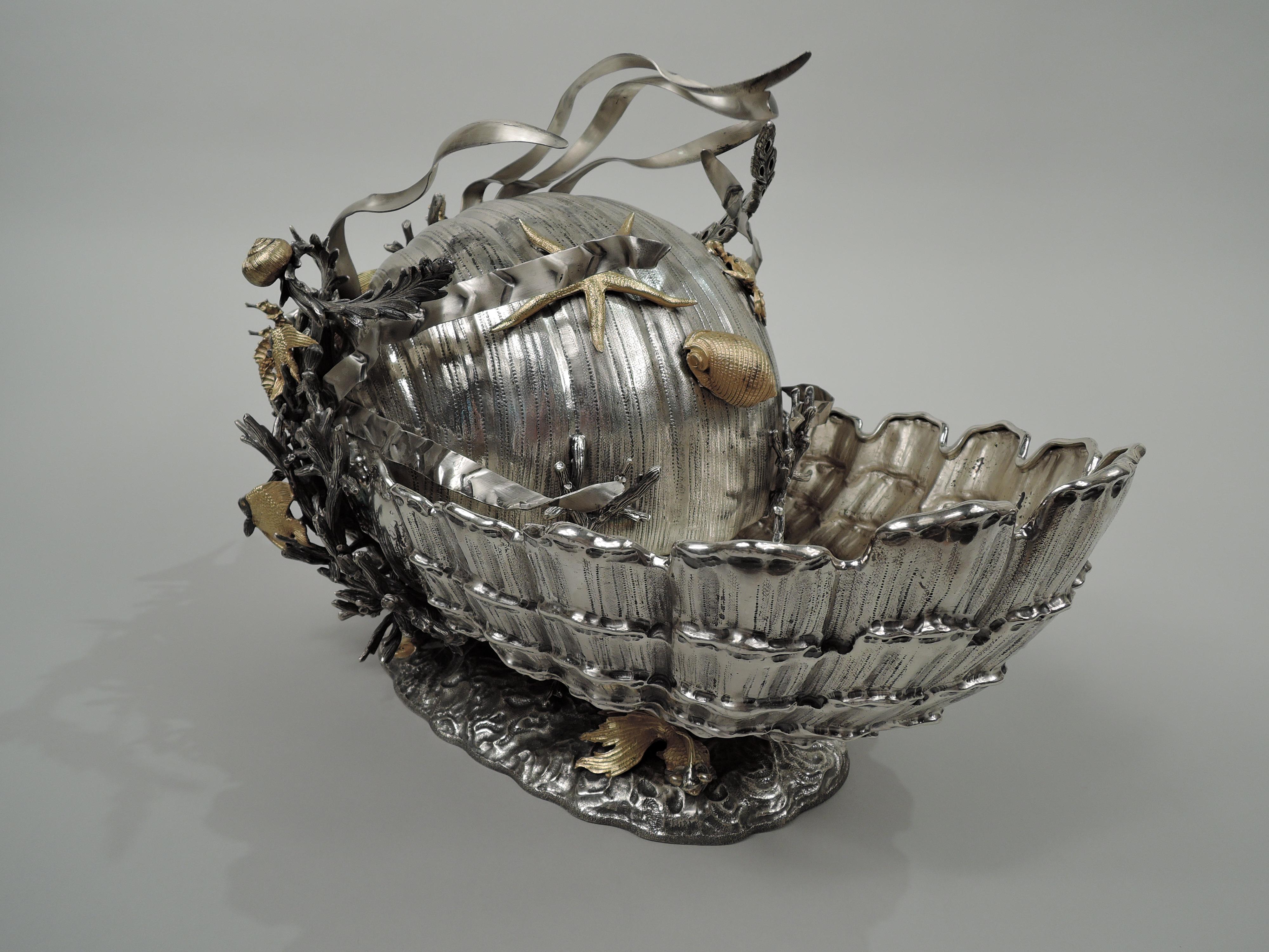 Italian Modern fantasy marine silver centerpiece. Ovoid shell with second hemispheric shell set in back on ovoid seabed base. Naturalistic irregularities, striation, and accretions as well as a thriving crustacean community with crabs, snails, and