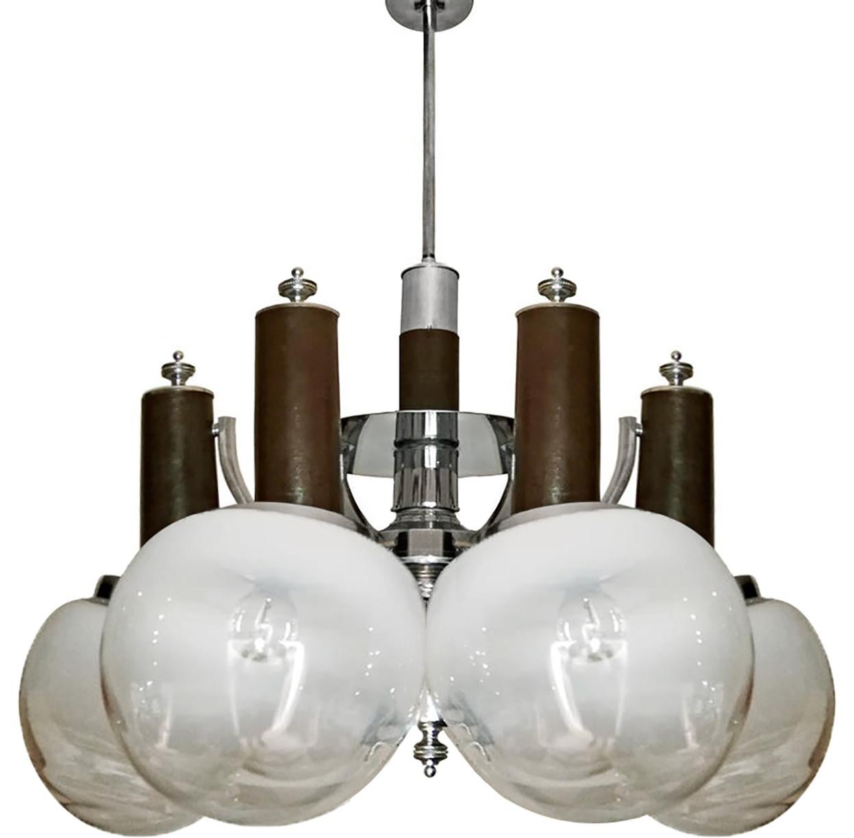 Fabulous vintage Italian Mid-Century Modernist Murano Mazzega era art glass chrome orbit chandelier with opaque white and clear art glass globes and dark chocolate faux leather.
Measures: Globe/diameter 8 in. (20 cm).

Measures:
Diameter 26 in / 66