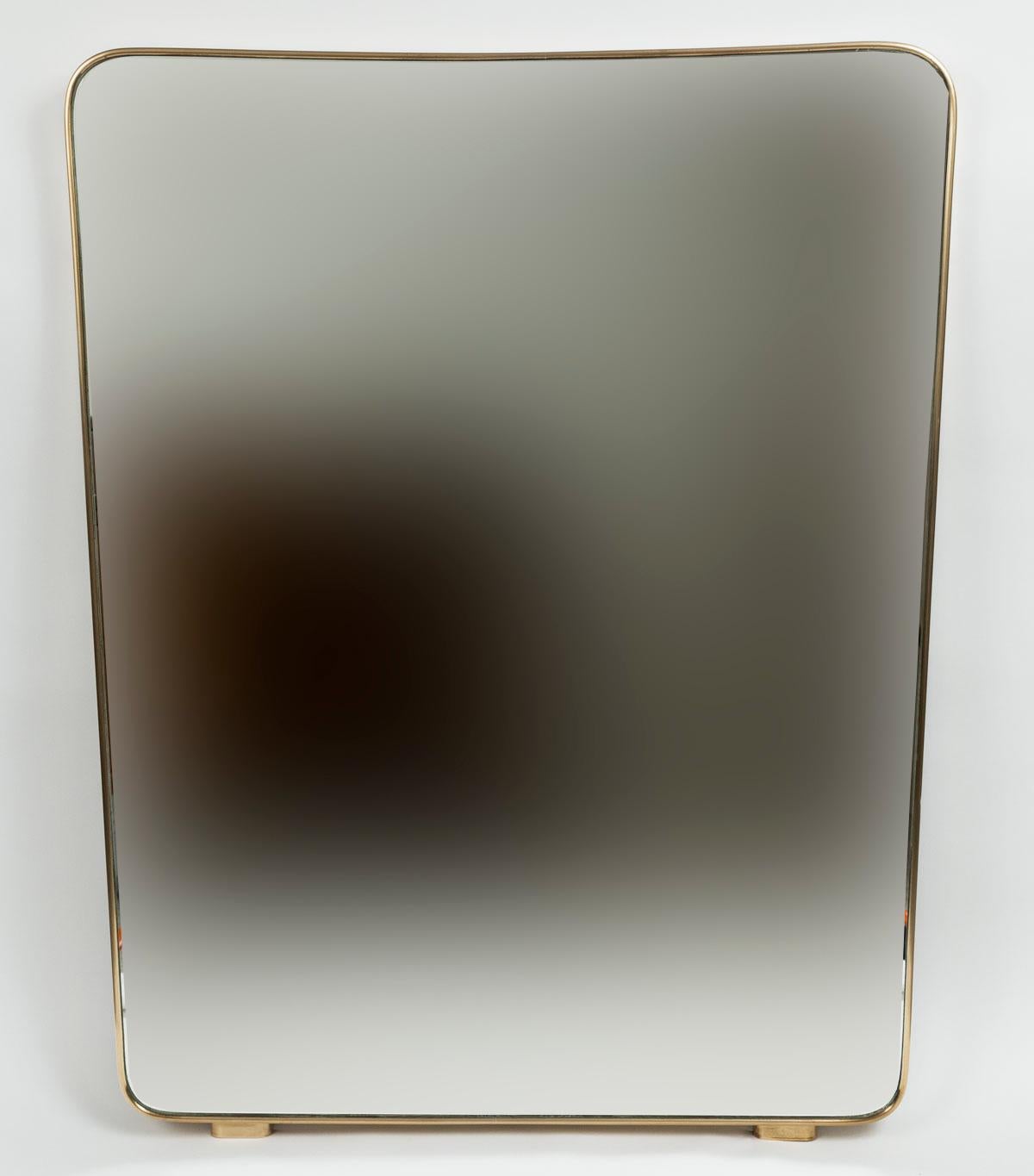 An all orginal period Italian Design mirror in a modified tapered rectangular shape-great scale and form and shown with its orginal wooden back.

Origin: Italy

Dating: 1950ca

Condition:Very Good, brass is handpolished, looking glass was replaced