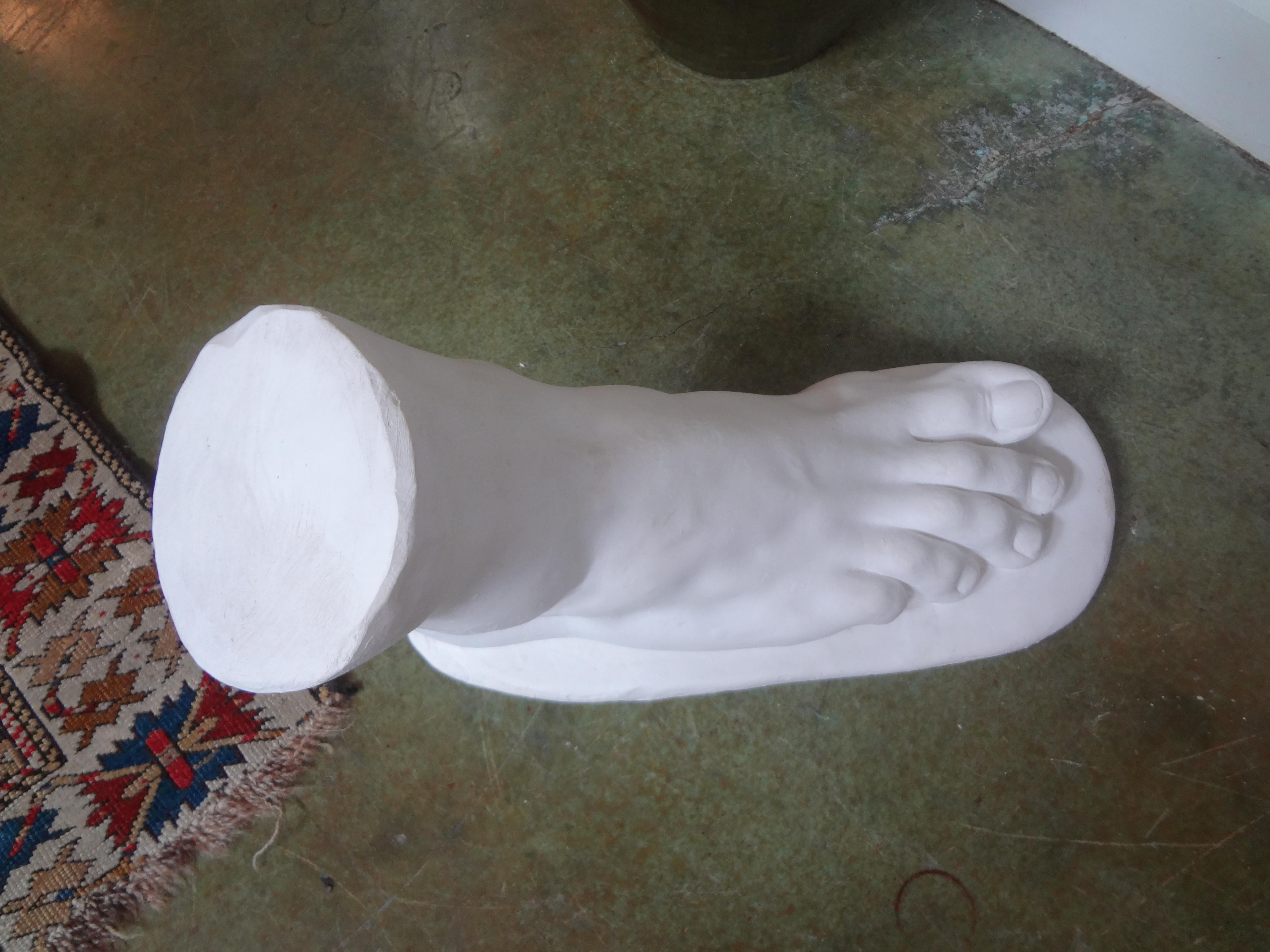 Unusually large and well detailed neoclassical Roman plaster foot sculpture of Hercules. This vintage Italian academic plaster foot sculpture would look excellent in a Contemporary, Mid Century, Hollywood Regency, Post Modern or Neoclassical