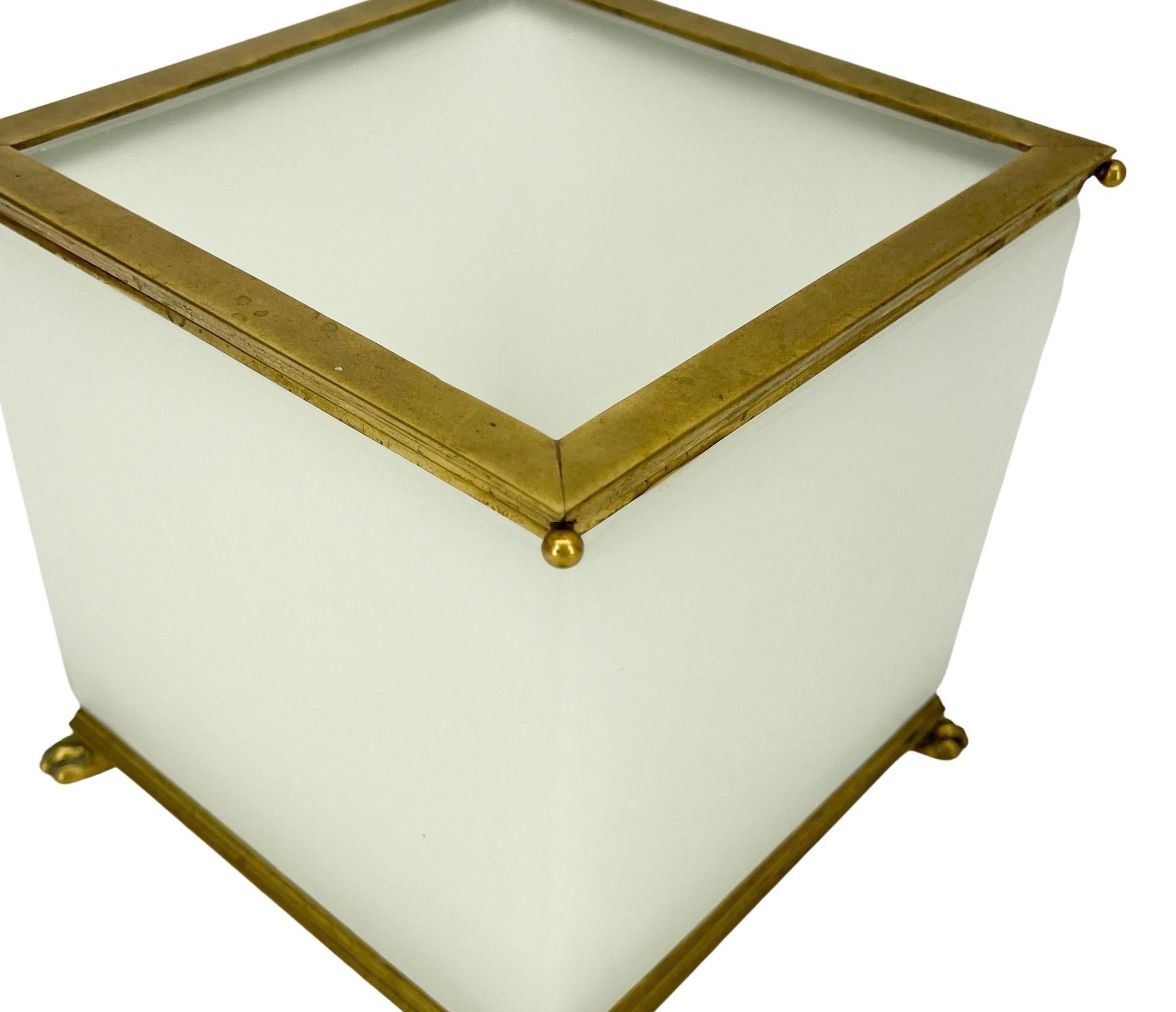Large Italian Cube Shaped Opaline glass planter Jardiniere With Brass Hardware.
The brass is presented in its authentic patina but can be polished upon buyers request. The brass will in that case be very shiny og gold-like.
All 4 corners have the