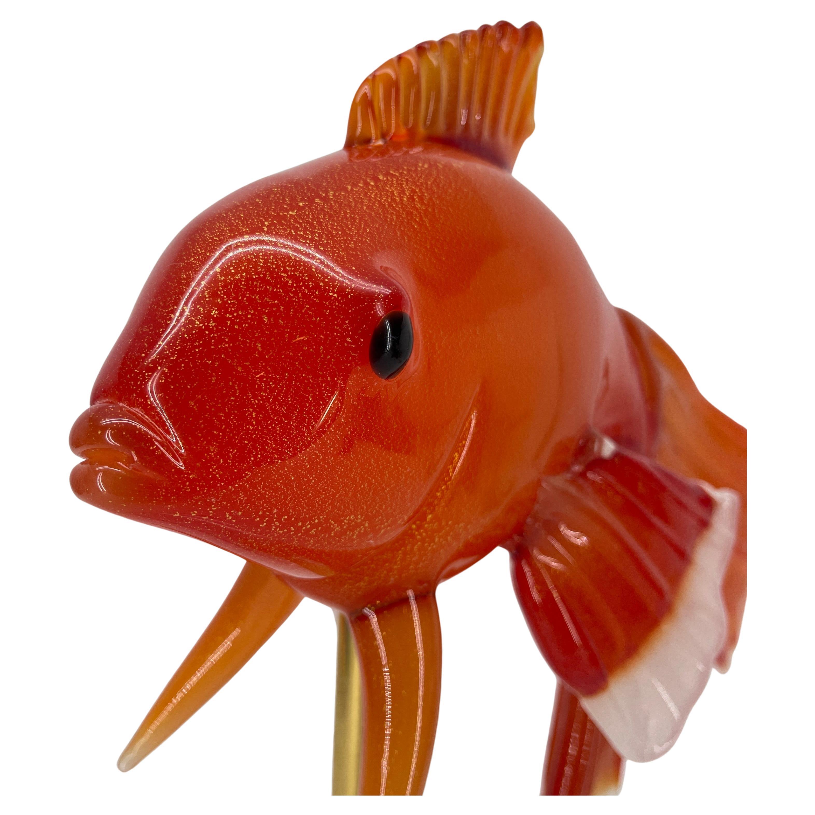 Large sculptural fish in orange and white glass on thick Lucite base.
Signed by Murano artist Pino Signoretto, limited edition 14/250.

Pino Signoretto (1944-2017) was born in 1944 in a small town near Venice; in 1954 he started working in a