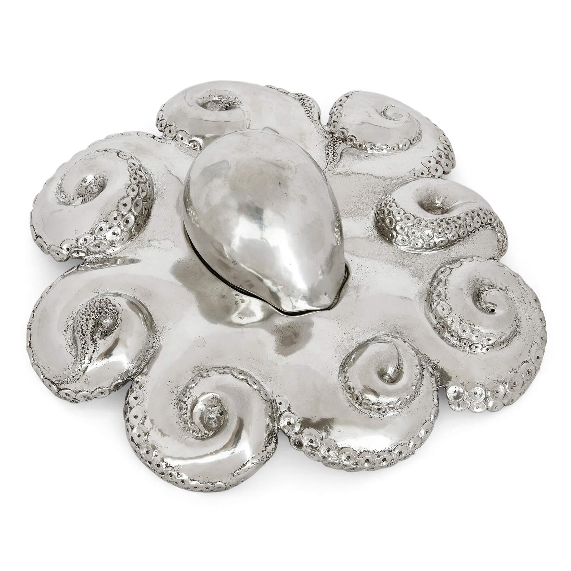 Large Italian Pewter octopus-form caviar dish by Piero Figura
Milan, Late 20th Century
Width: 38cm

This remarkable and unmissable piece is a pewter caviar-dish made by the Milanese craftsman Piero Figura, for the firm Atena, in Italy in the