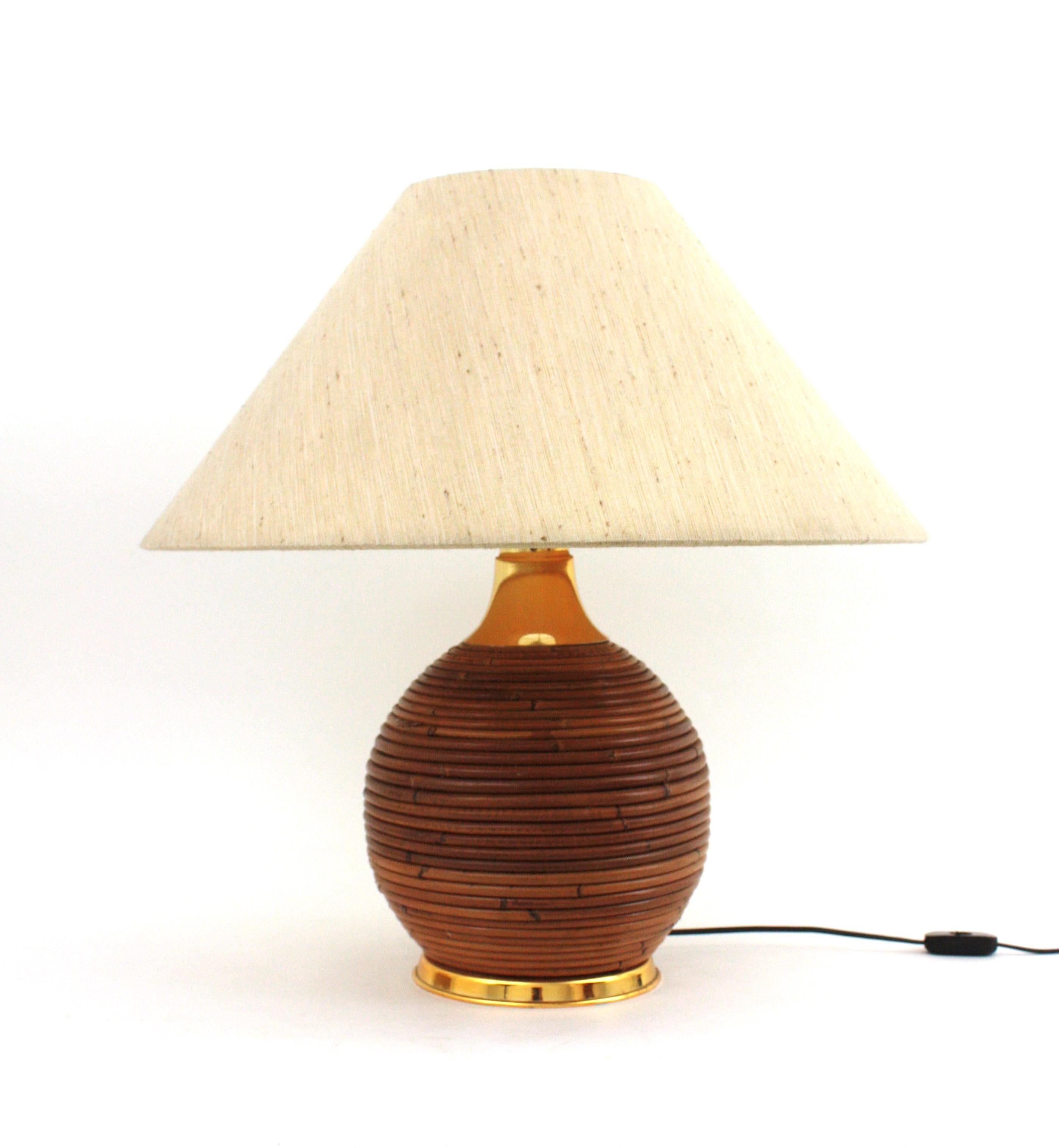 Mid-Century Modern Rattan Pencil Reed Table Lamps with Original Linen Lampshade

Pencil Reed Rattan and Brass Organic Modern Vivai Del Sud Ball Table Lamp, Italy, 1970s
This Pencil Reed Rattan Organic Modern Table Lamp has a design inspired in
