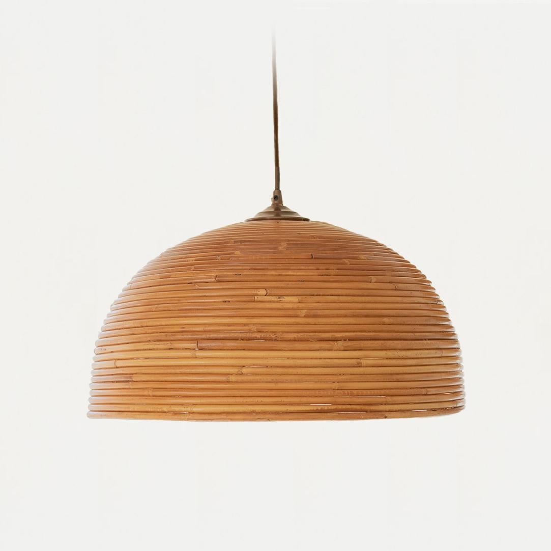 Vintage rattan dome pendant light from Italy, 1960's. Original rattan dome with brass detailing, new brown cloth cord and original rattan dome canopy. Dome measures 17.5