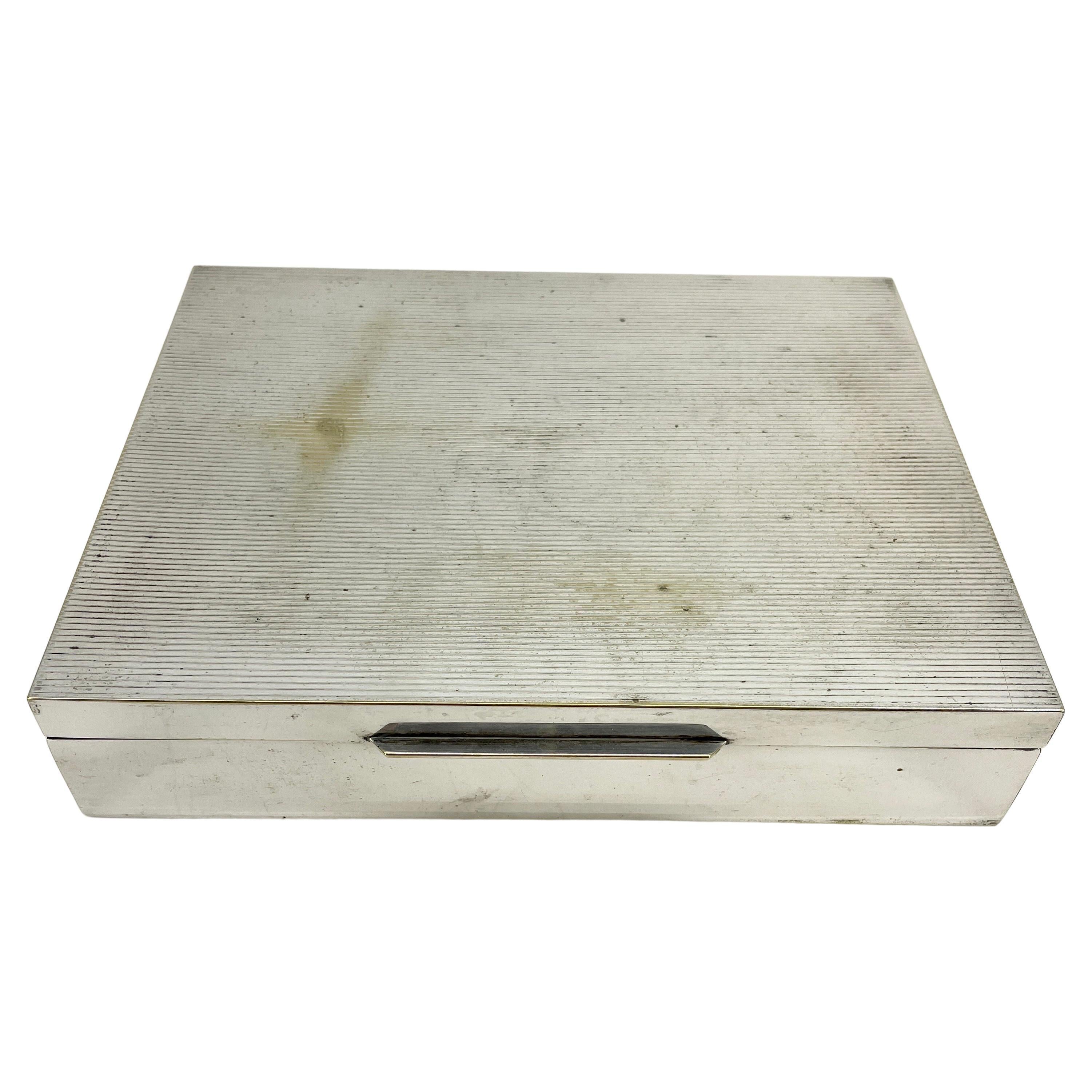 Large Classic Italian Cigar Box in Thick Silver Plate With Striking Stripped Decor on the Top and Fitted with the Original Cedar Wood Lining. Marked made in Italy.


