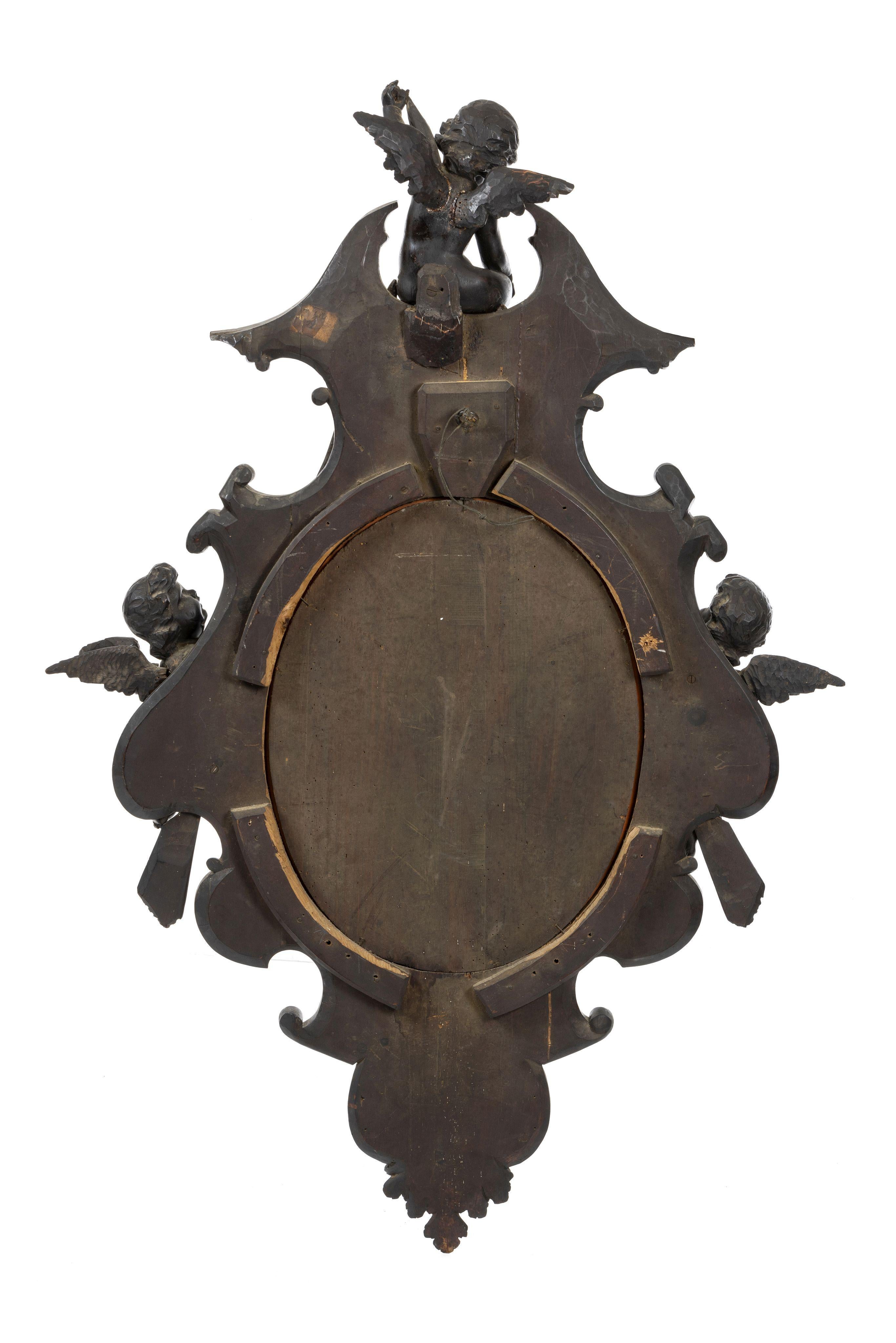 Wood Large Italian Rococo Revival Carved Cherub Oval Mirror, 19thC  For Sale
