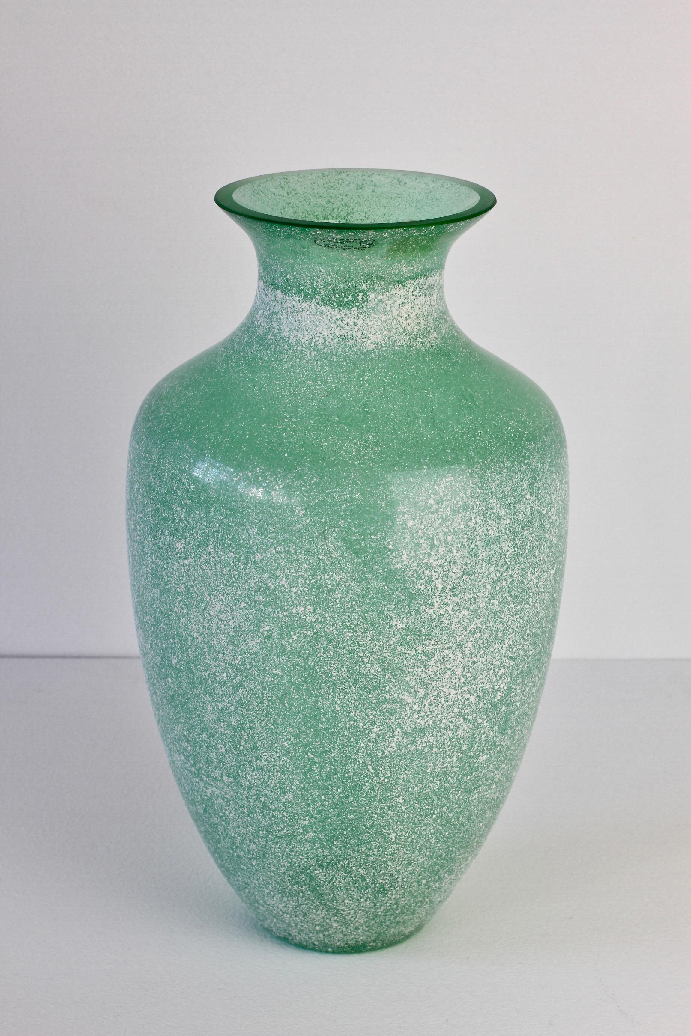 Large 35cm (13.5 inch) tall 'a Scavo' green colored / coloured glass vase by Seguso Vetri d'Arte Murano, Italy. Elegant in form and showing extraordinary craftmanship with the use of the 'Scavo' technique to replicate to look and feel of ancient